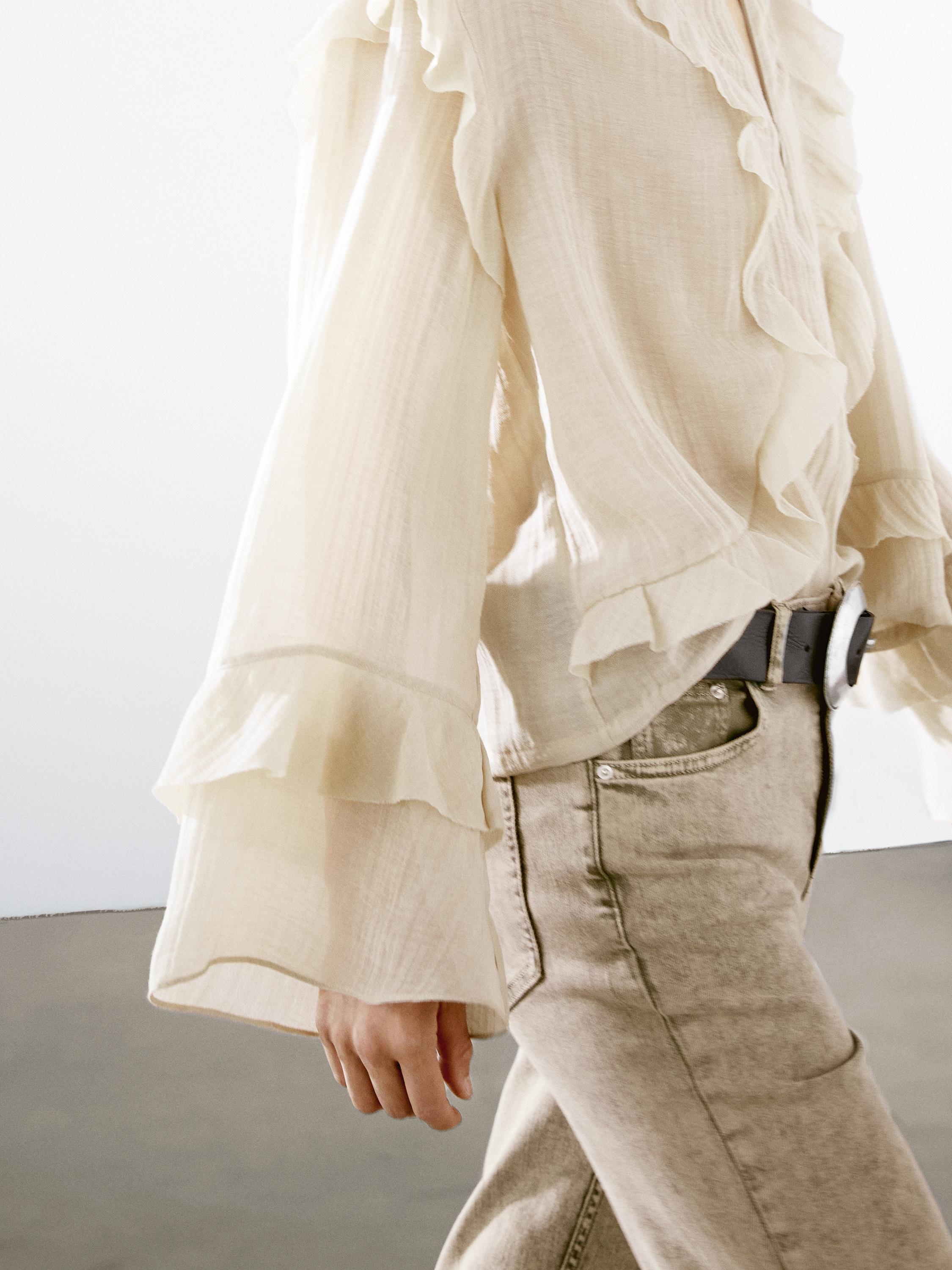 Flowing blouse with ruffles