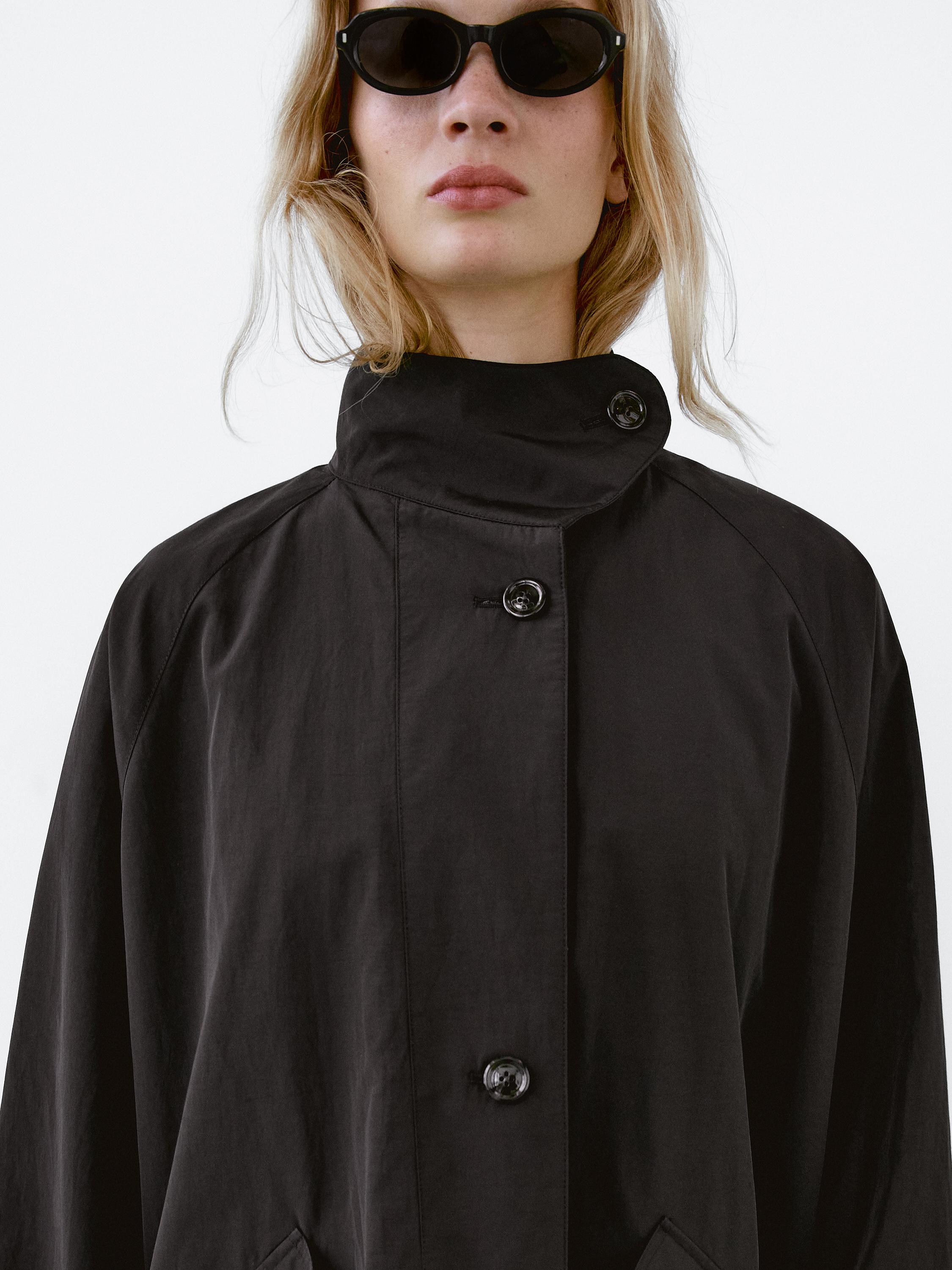 Oversize flowing trench coat in water-repellent fabric