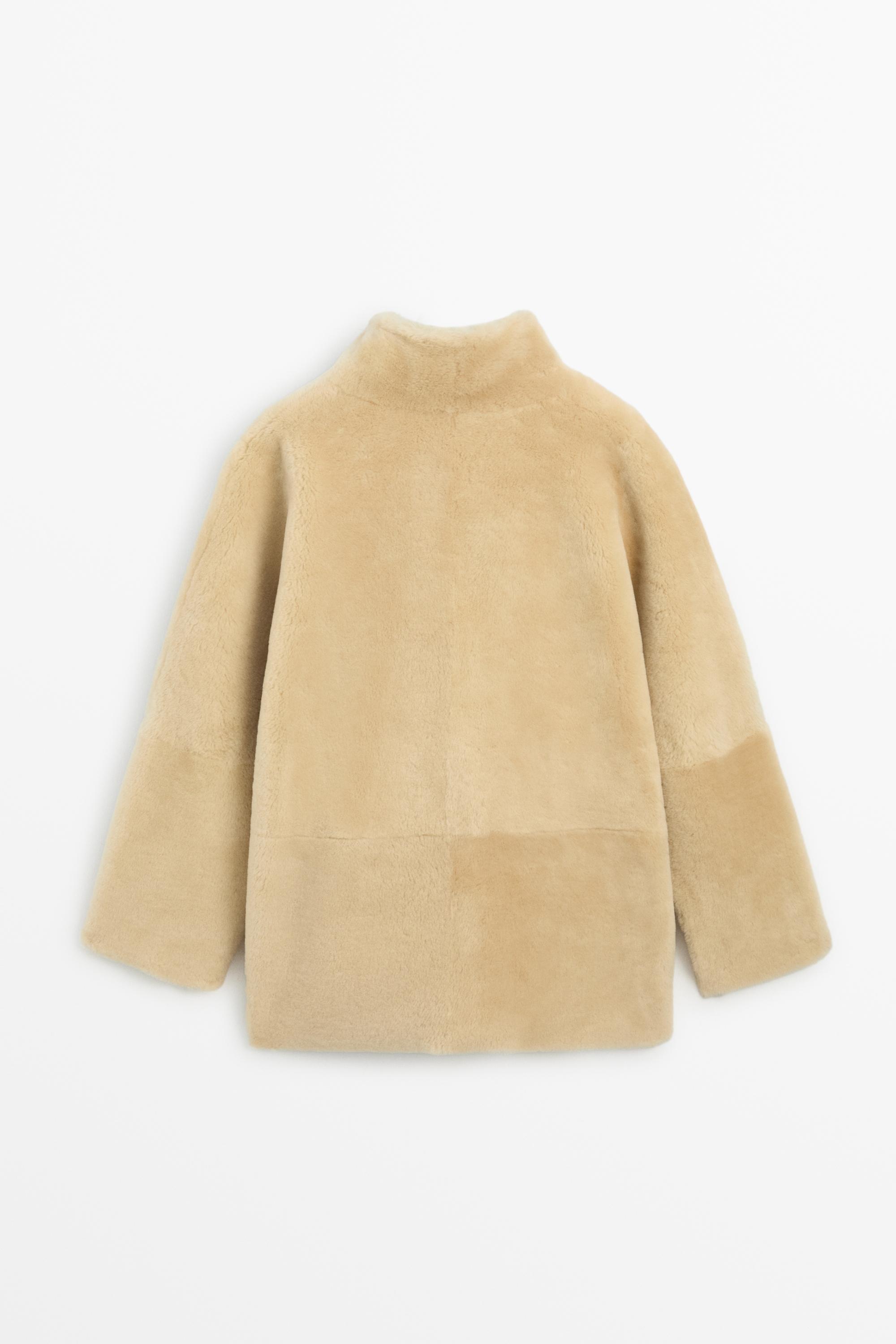 Reversible fur leather coat