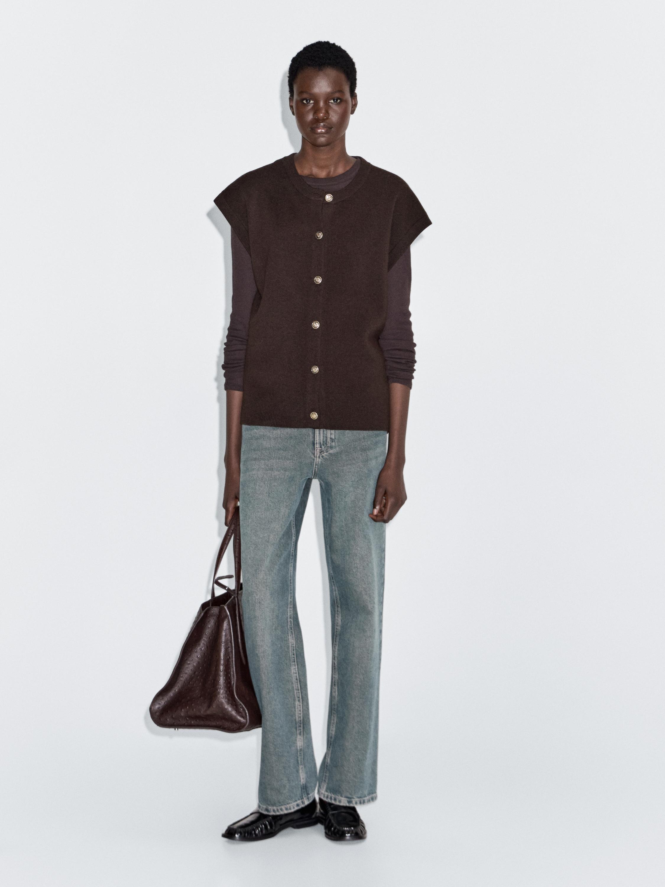 Knit vest with golden buttons