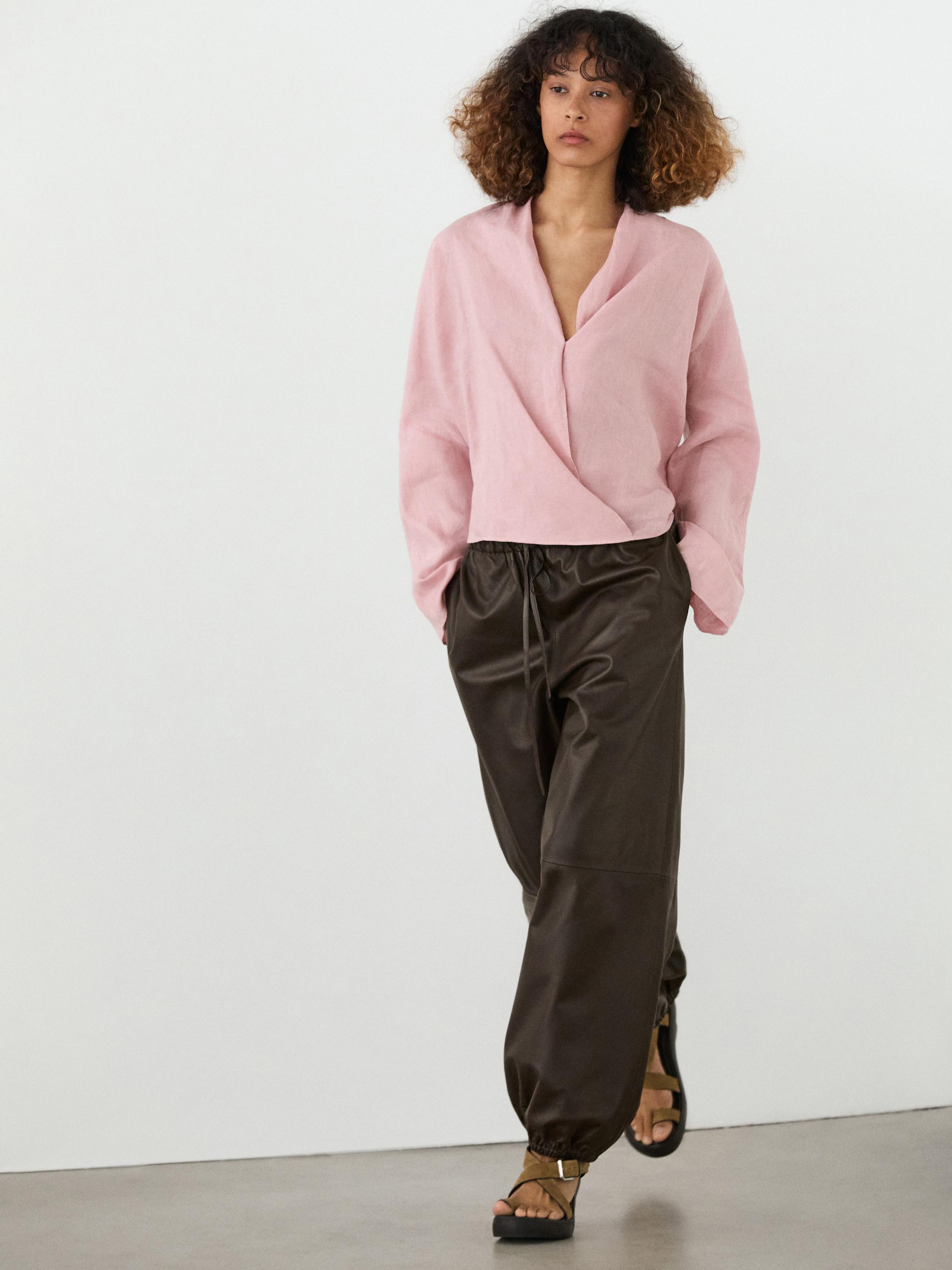 بلوزة كتان فضفاضة بتصميم متقاطع