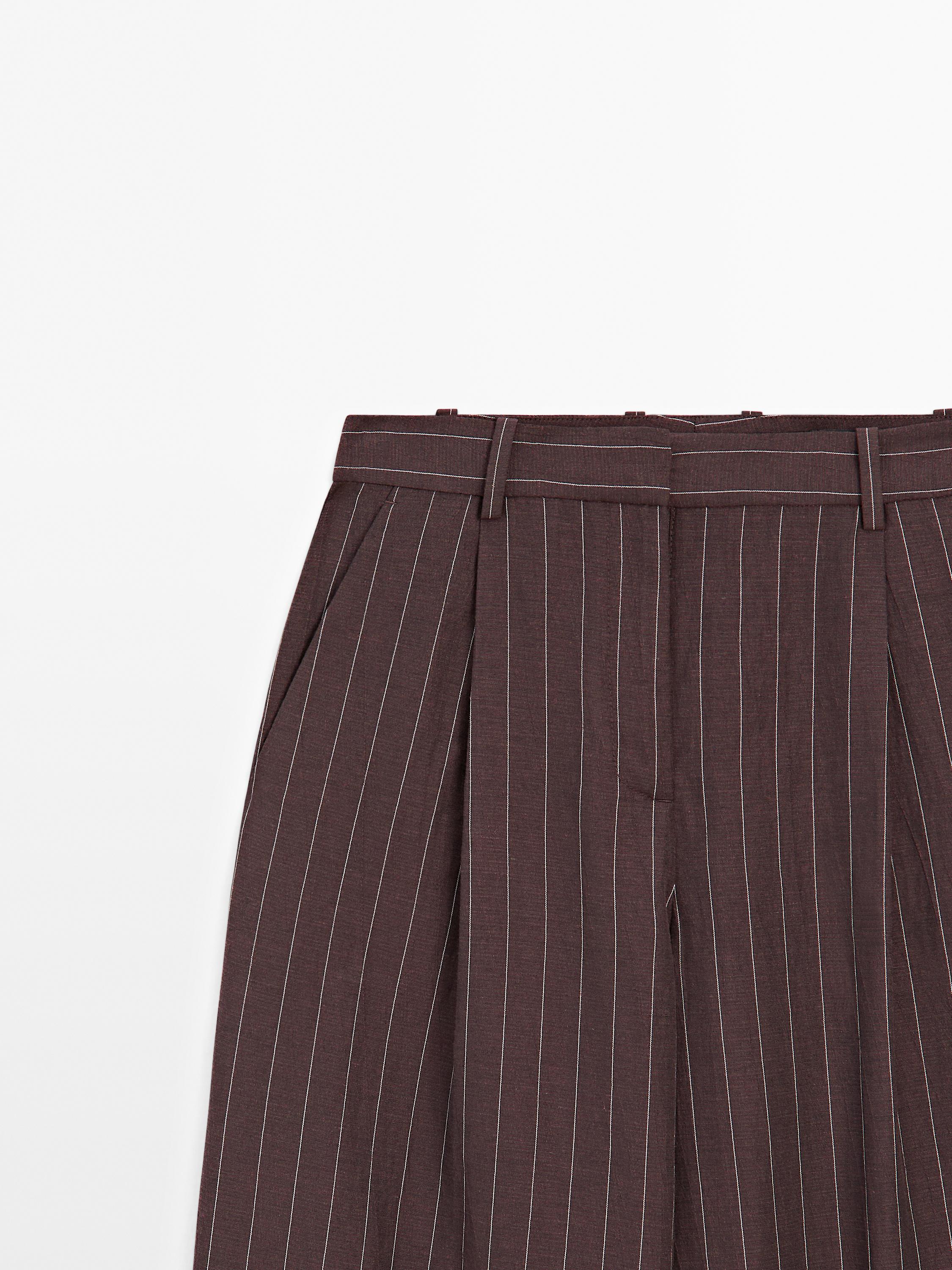 Darted pinstripe trousers