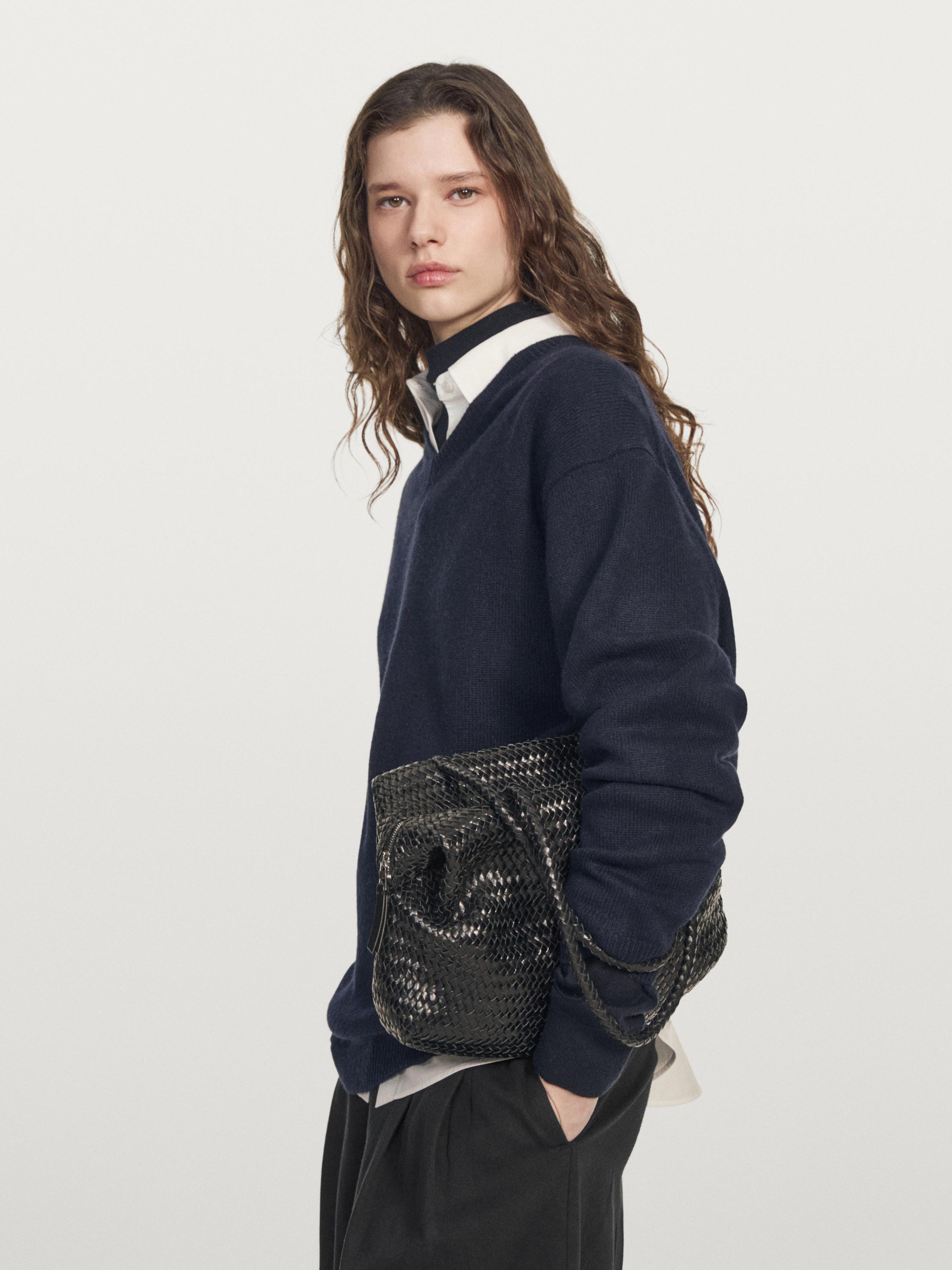 Jersey punto oversize cuello pico
