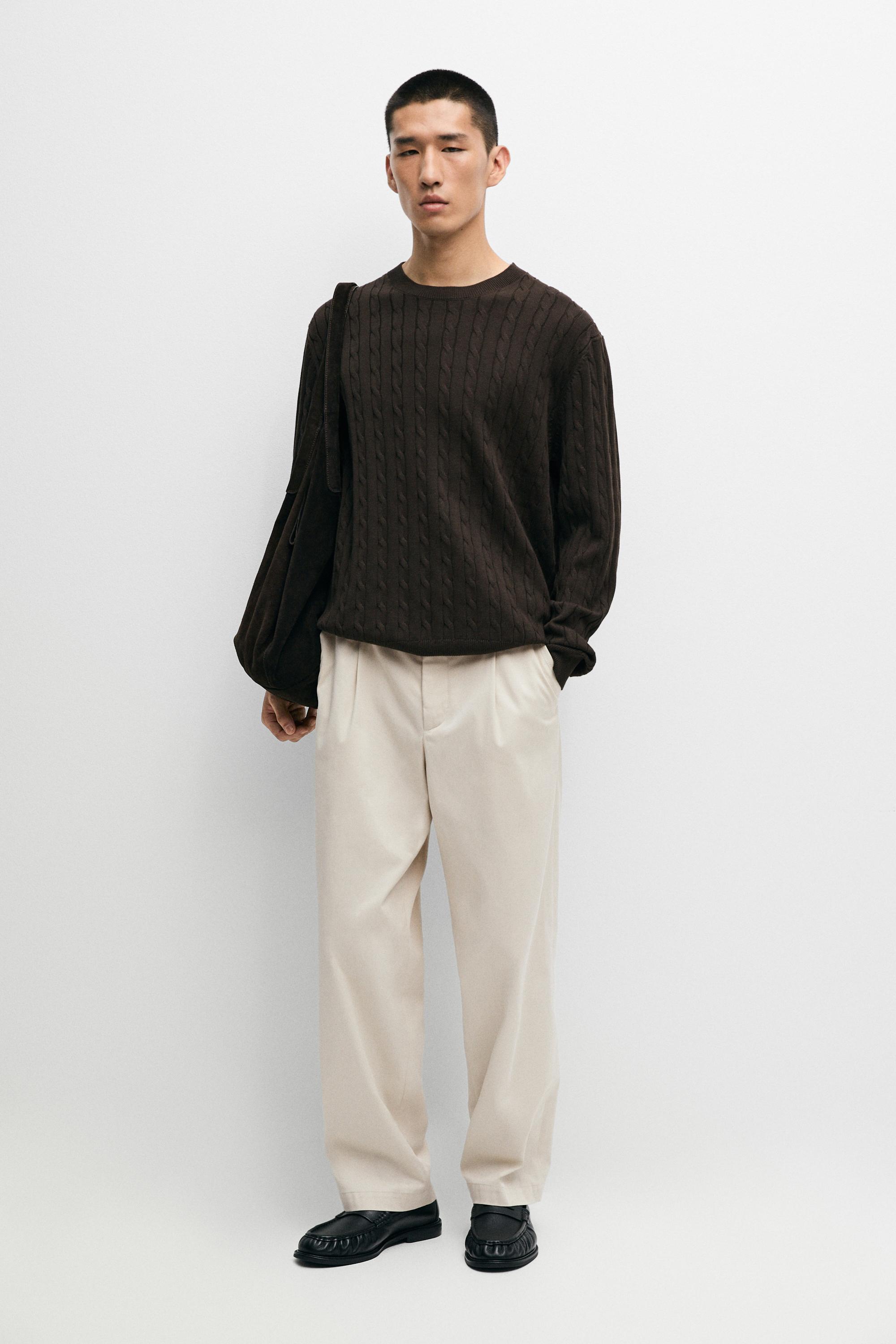 Cable-knit round neck sweater
