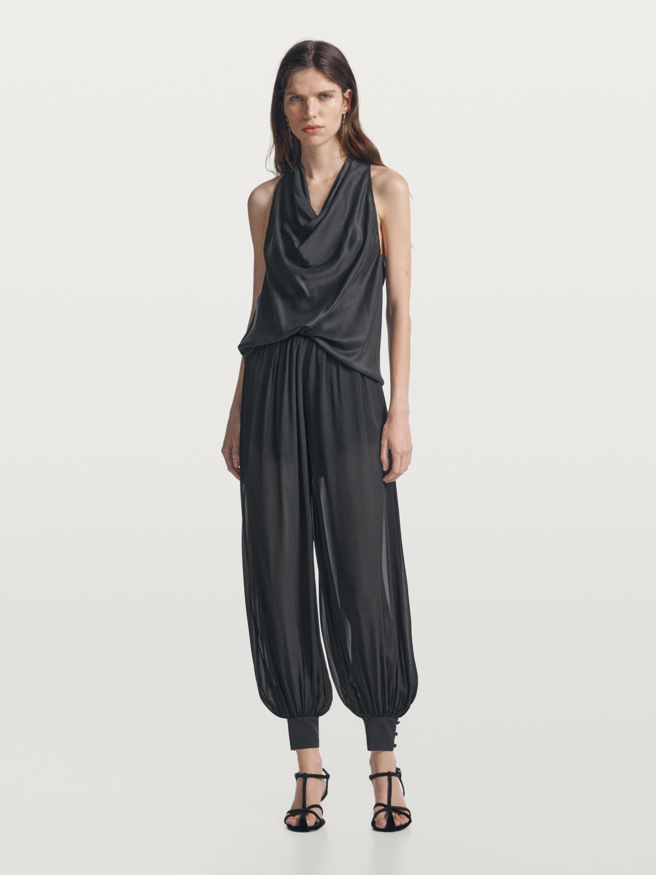 Semi-sheer sarouel trousers with button details — BLACK