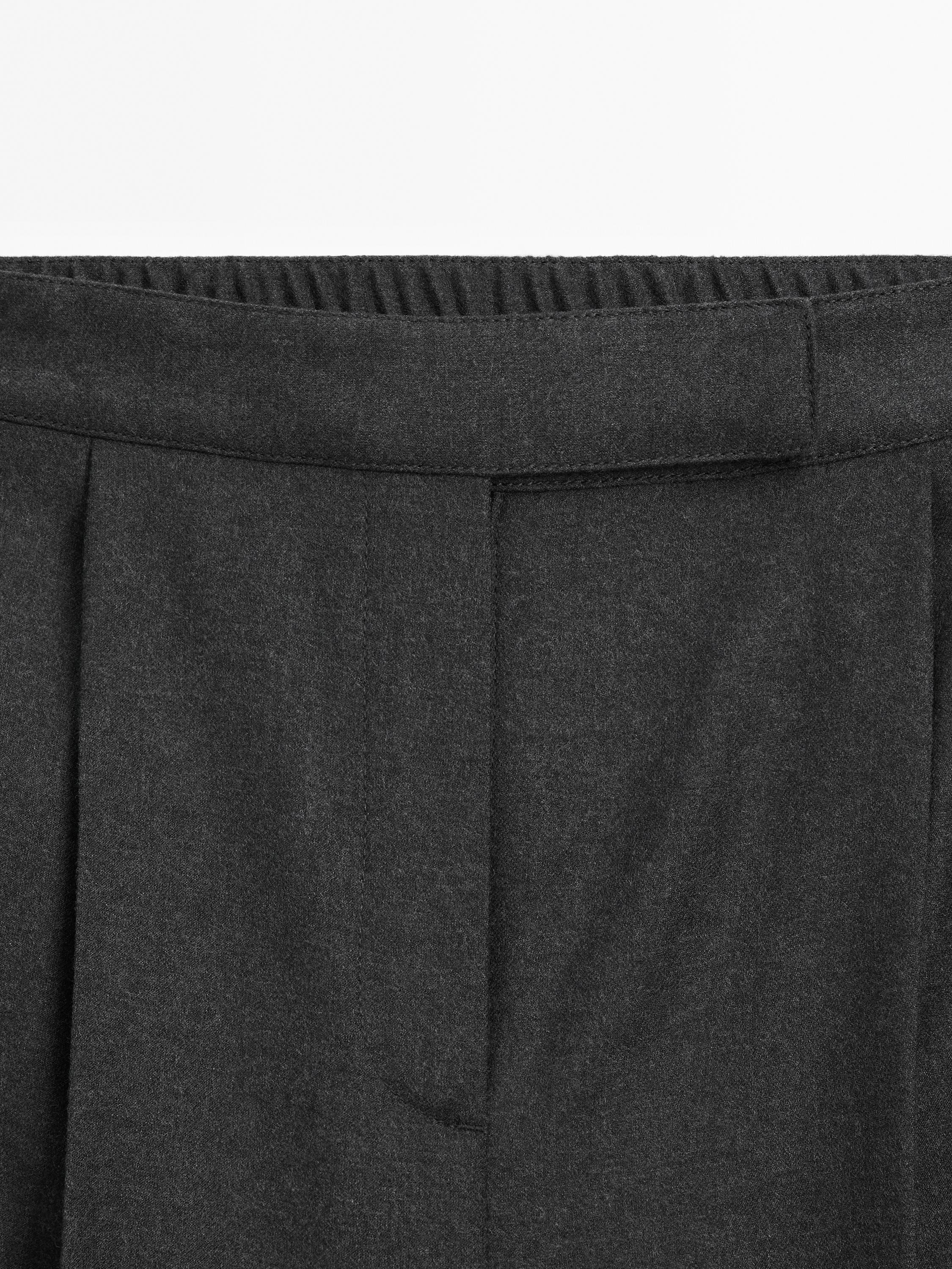 Flannel trousers with elastic detail