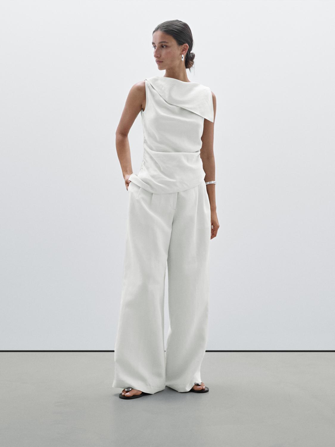 بنطلون فضفاض بقصة مستقيمة وبنسات