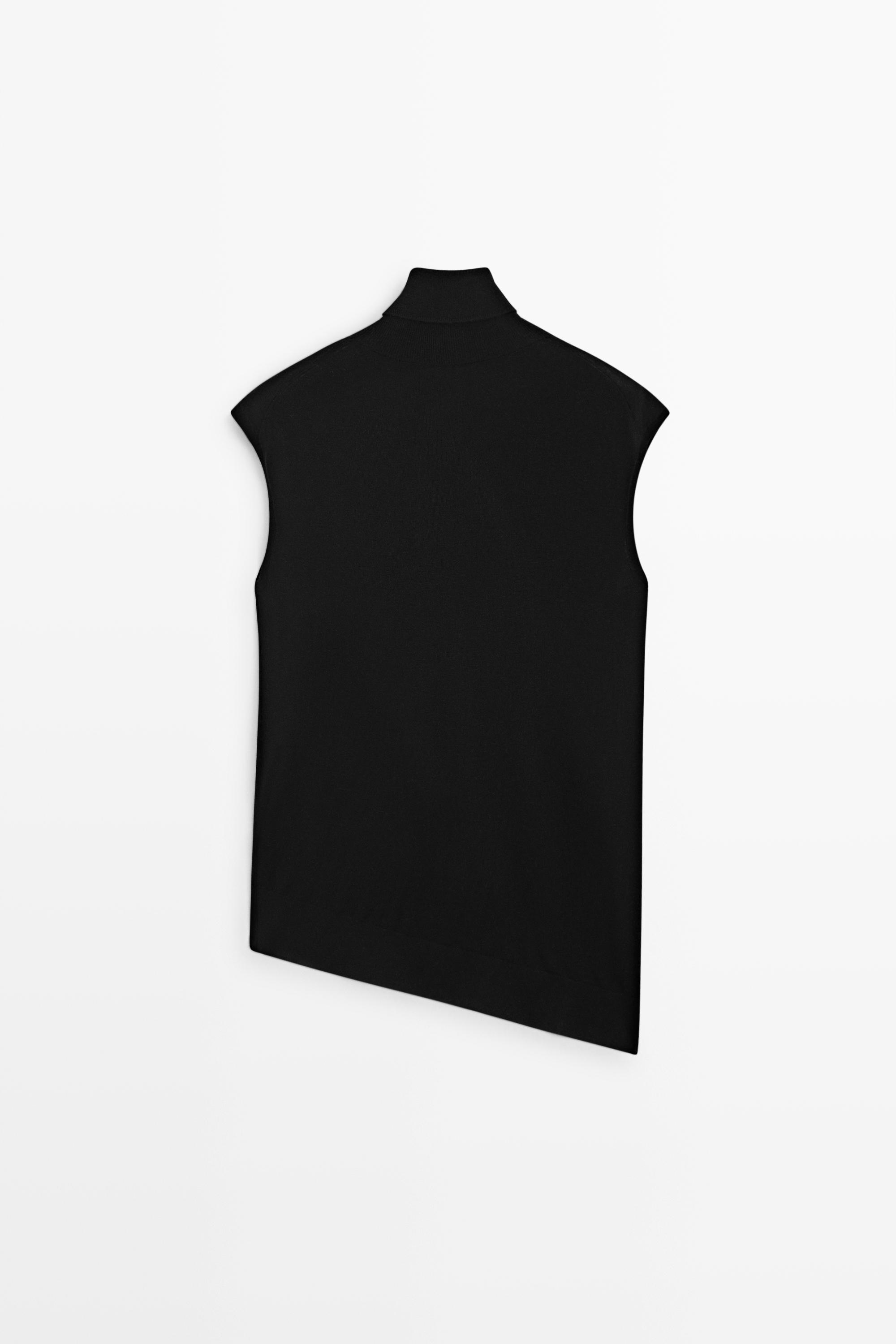 Asymmetric hem turtleneck top — BLACK