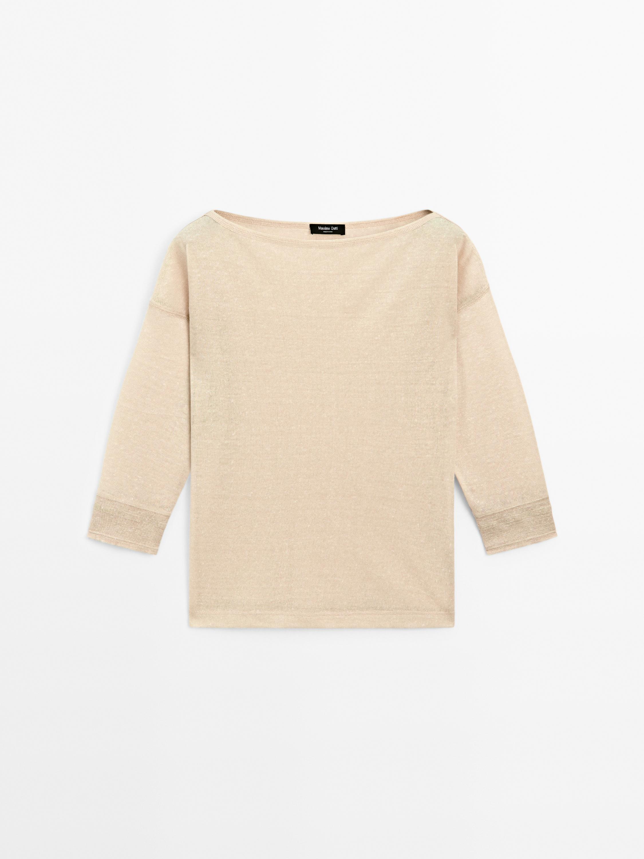 Front view of a long-sleeved, boat-neck beige T-shirt.