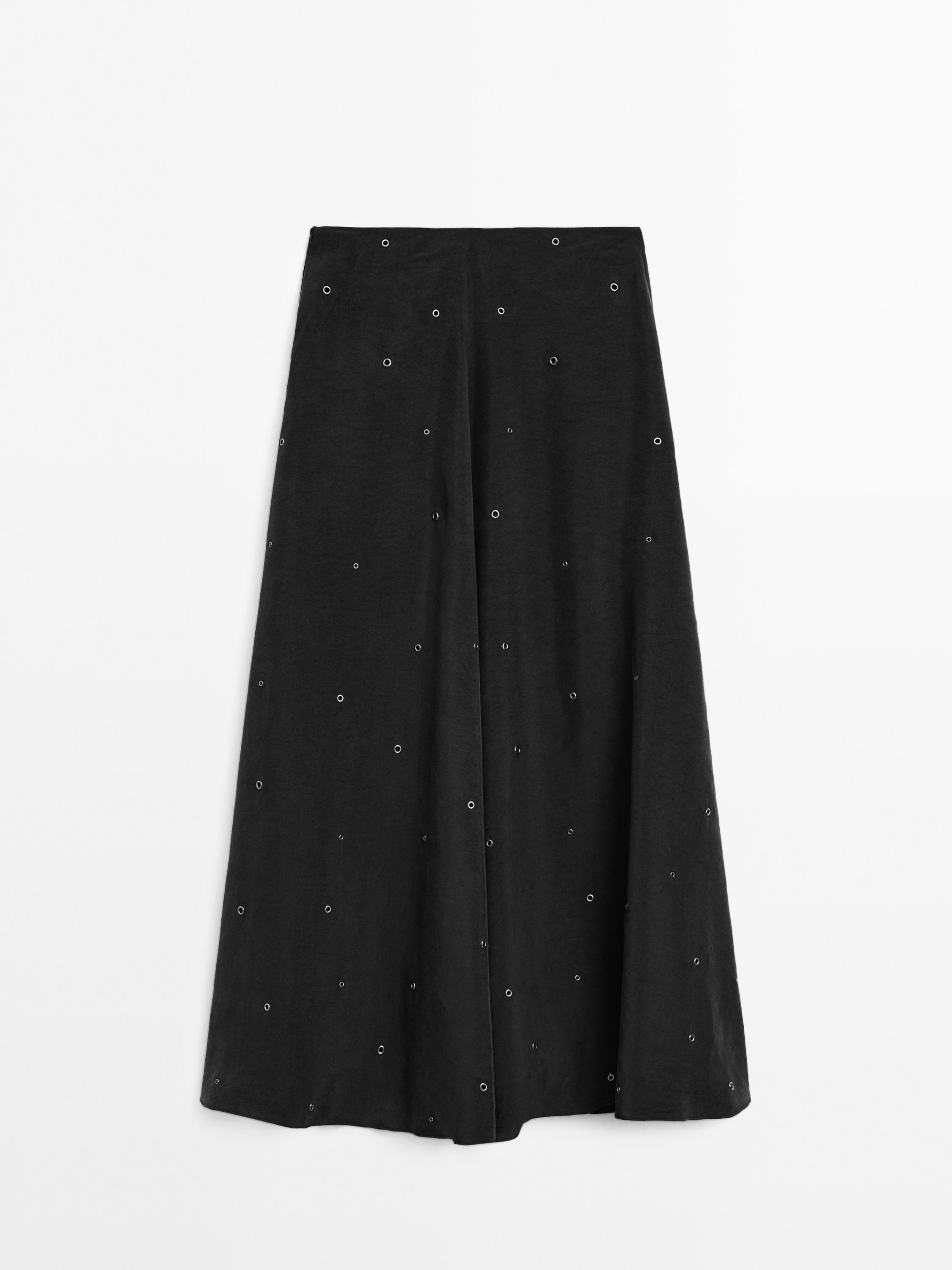 Long skirt with eyelets