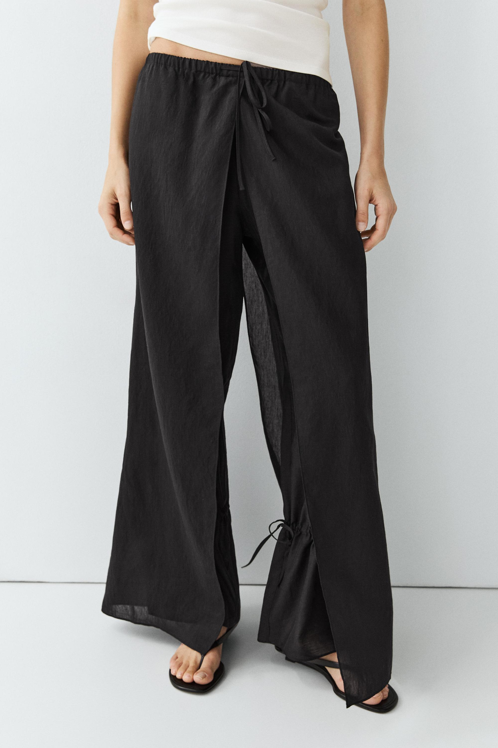 Double-layer pants with tie detail — BLACK
