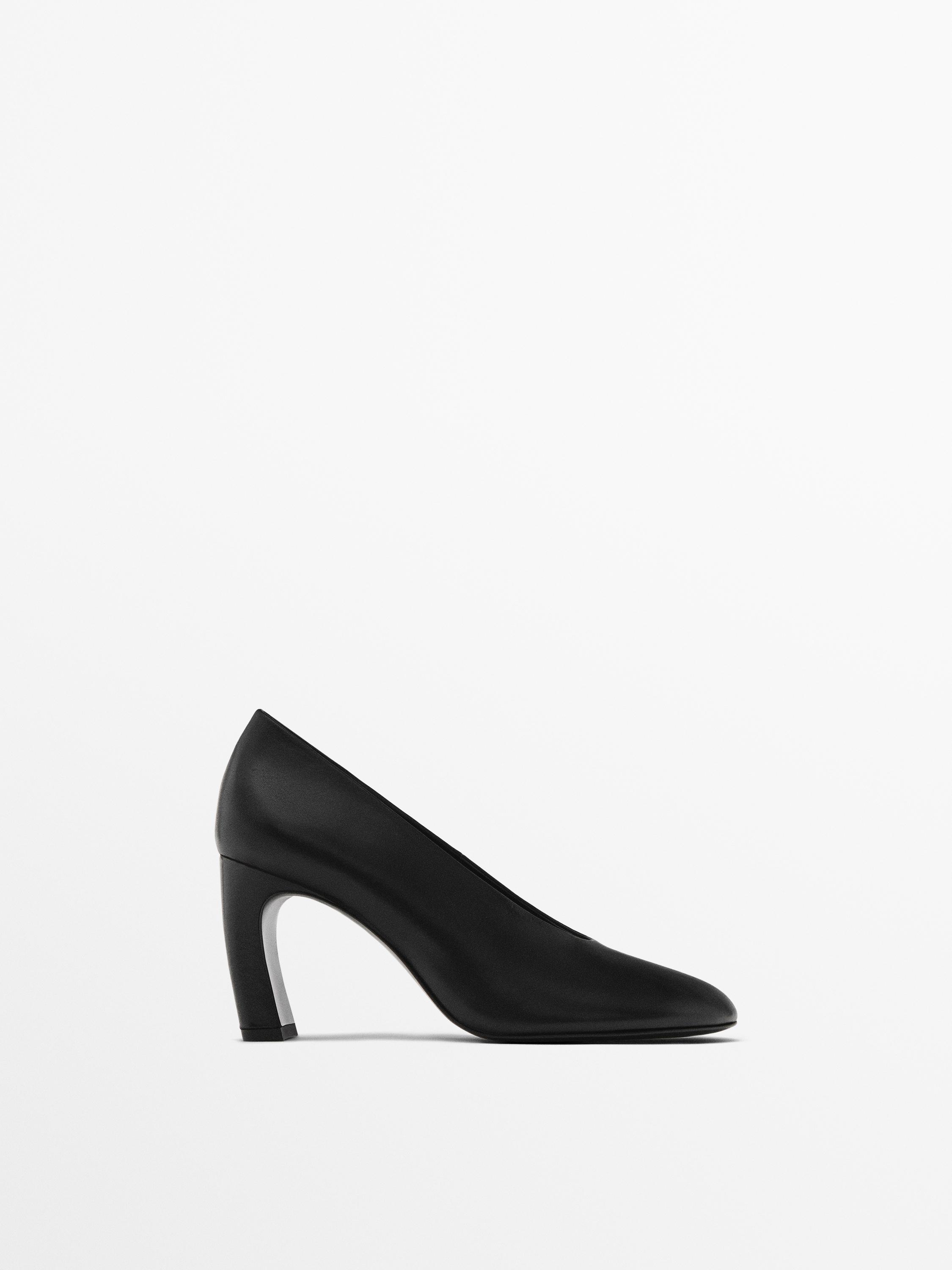 Heeled shoes with rounded toe