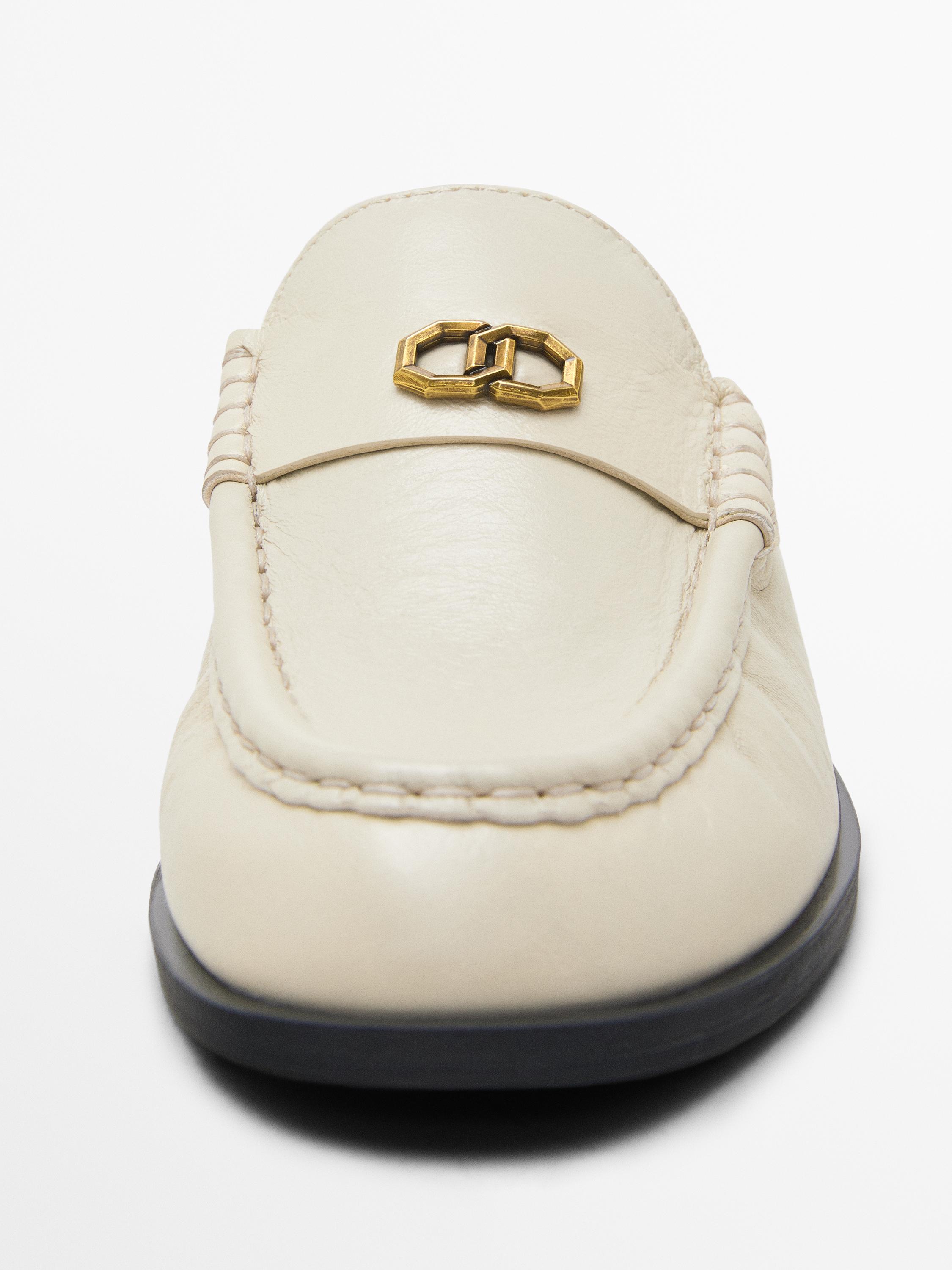Mules with metallic detail