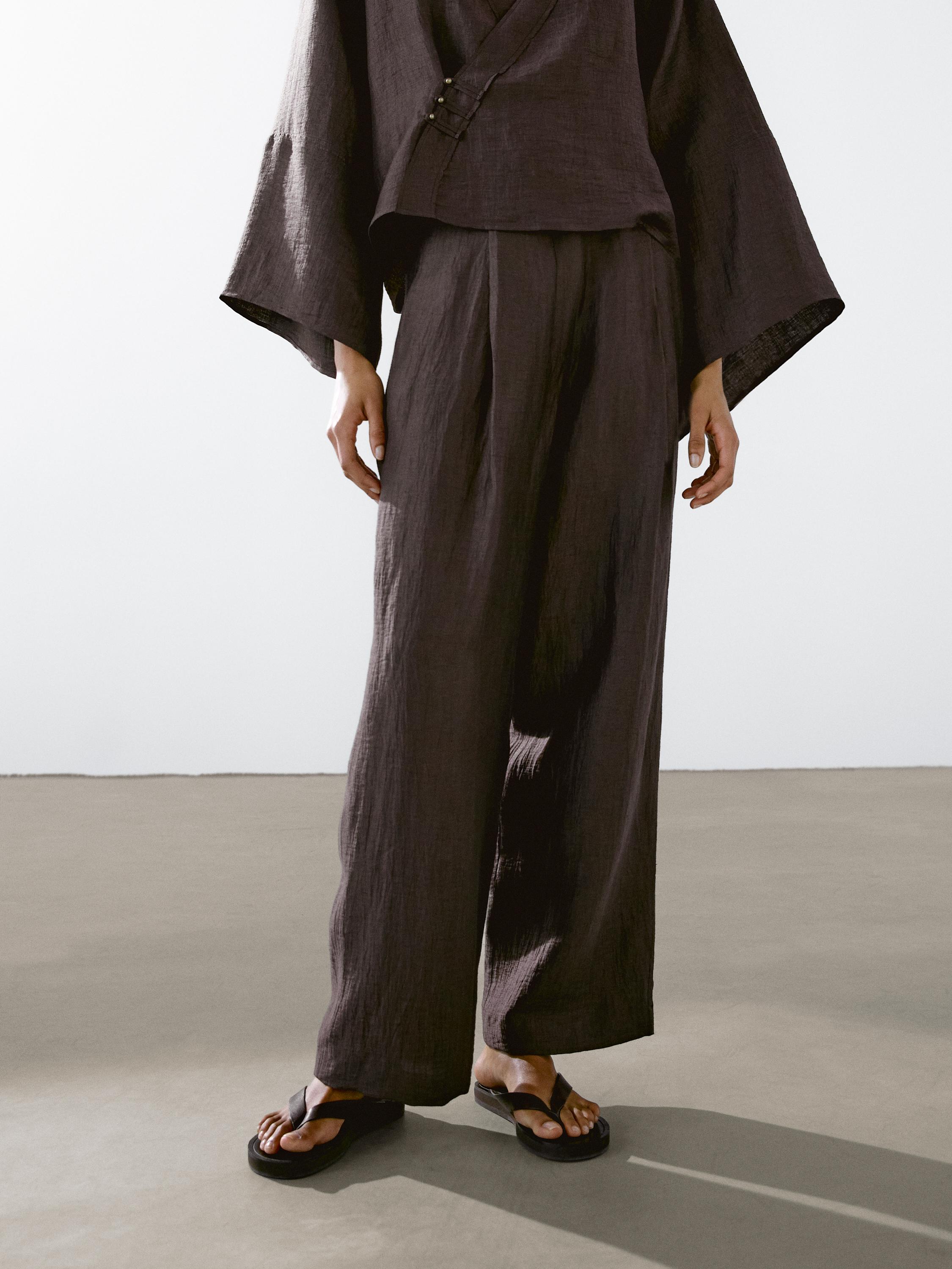 Flowing linen blend trousers with darts