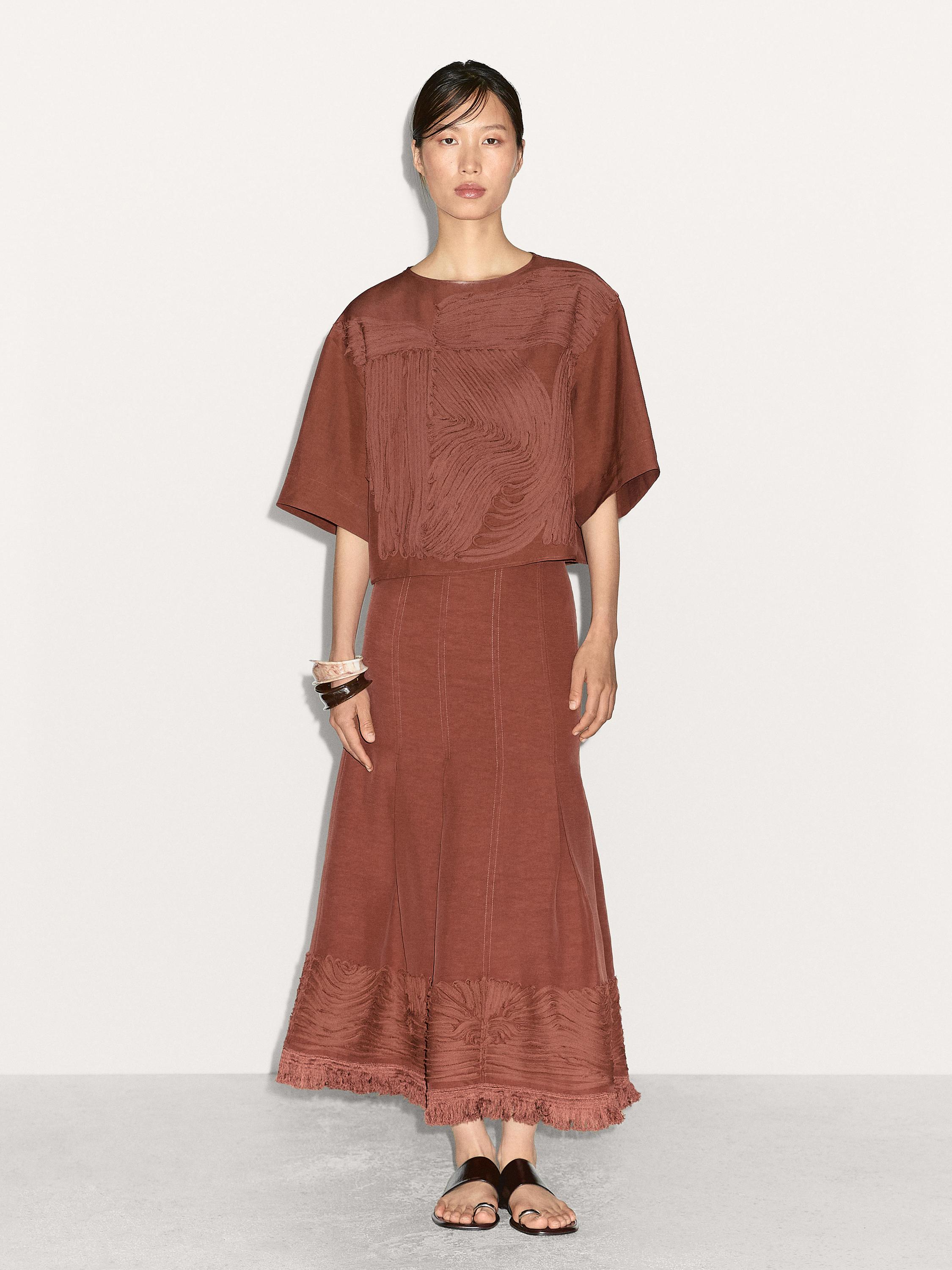 Flowing top with embroidered detail