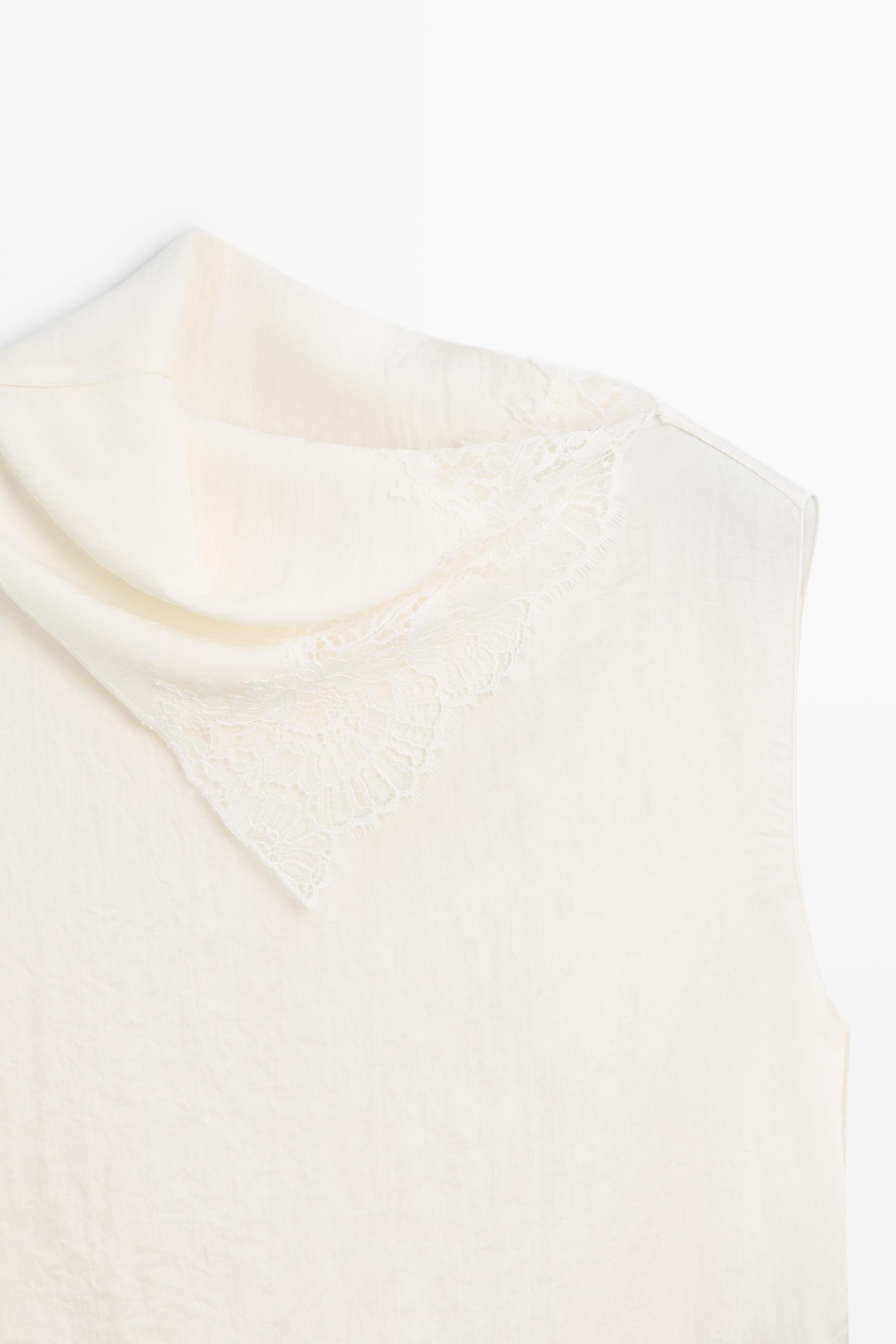 Asymmetric roll neck top with lace detail — CREAM