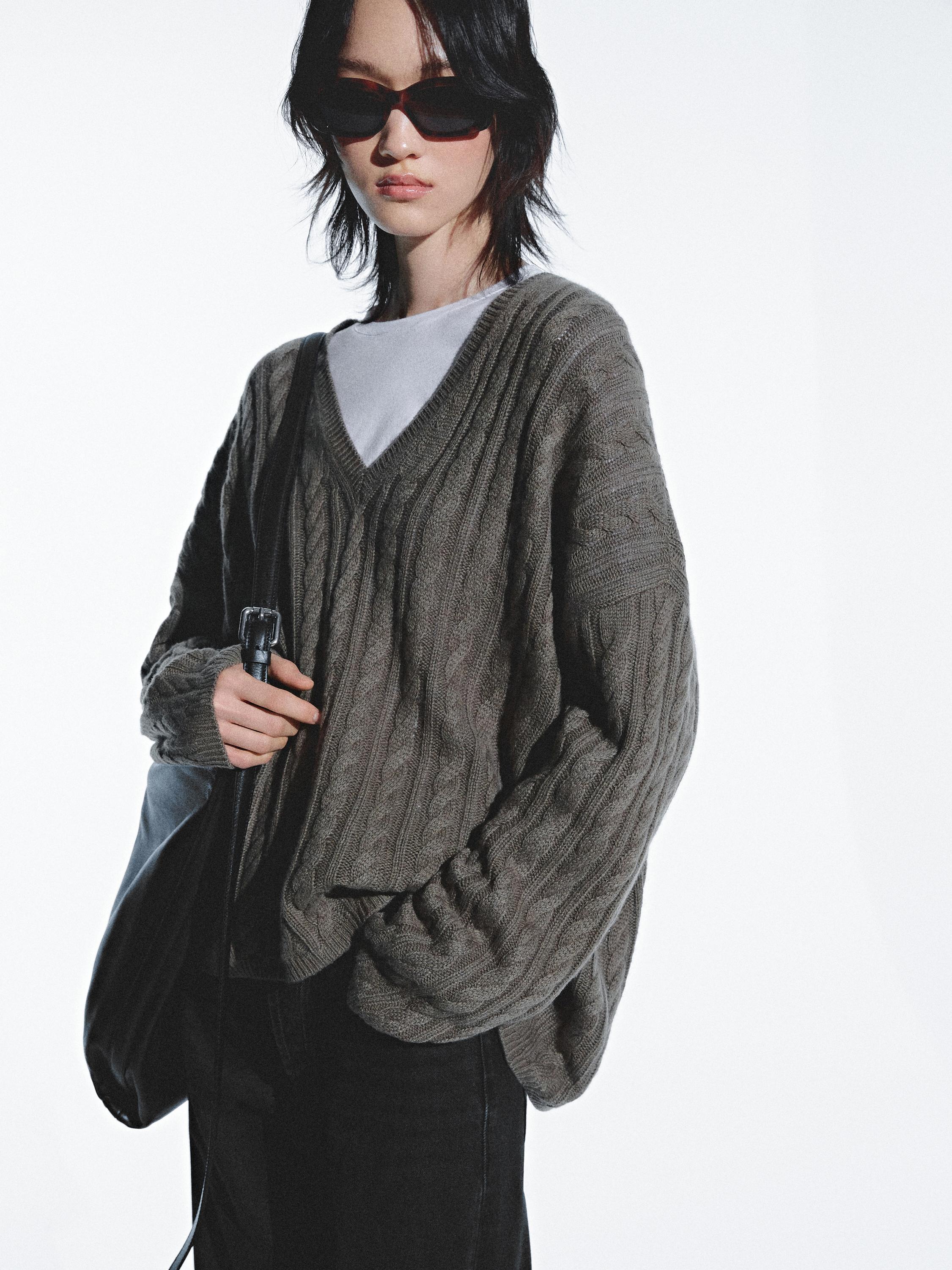 Cable-knit V-neck sweater