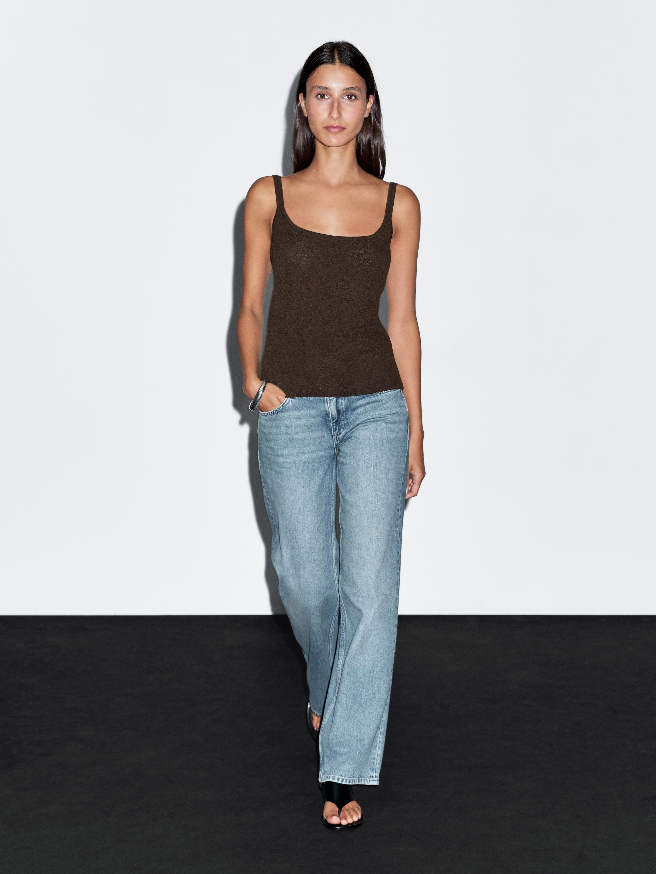 Flowing knit top with straps