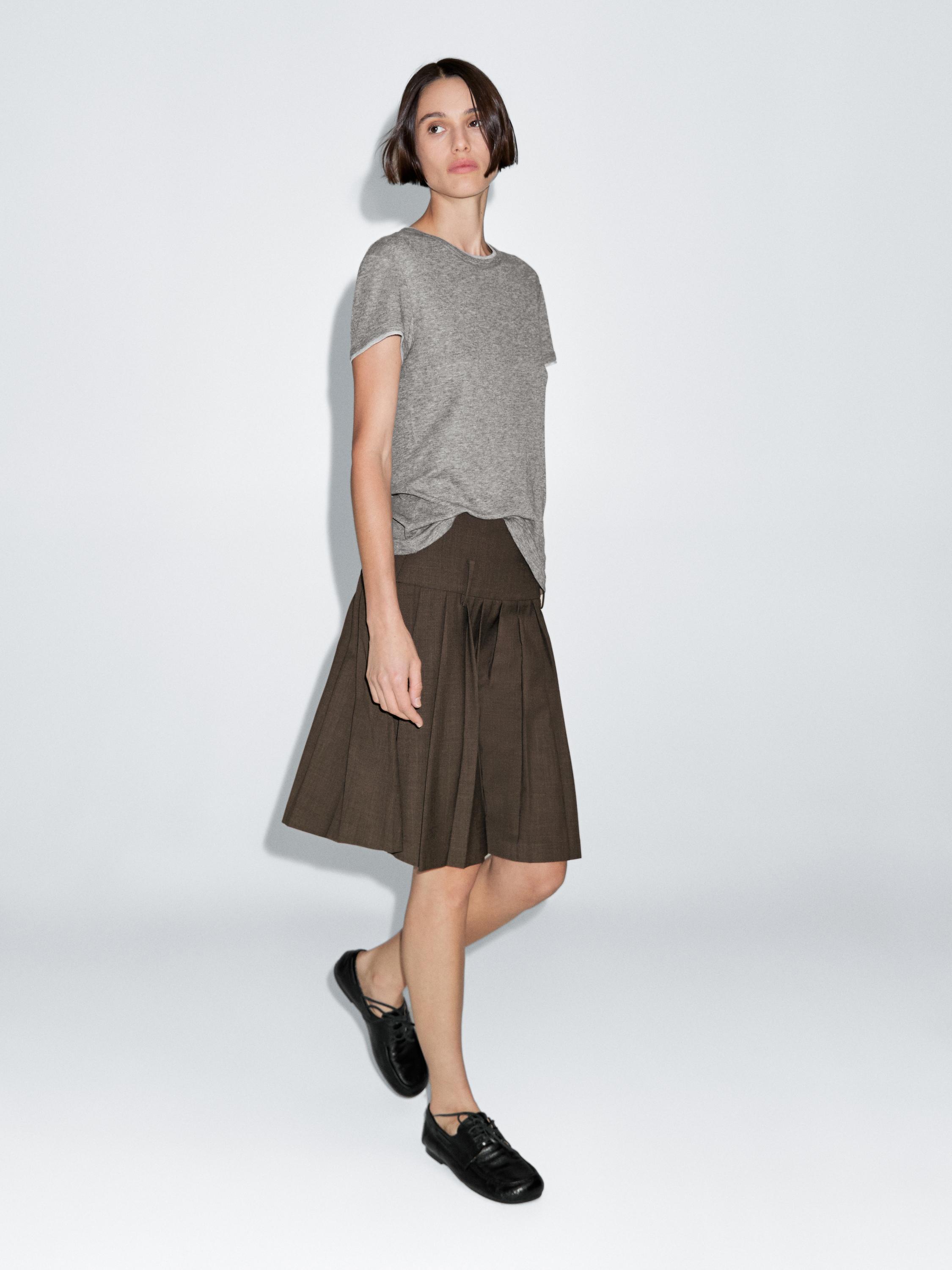 Falda corta fajín tablas