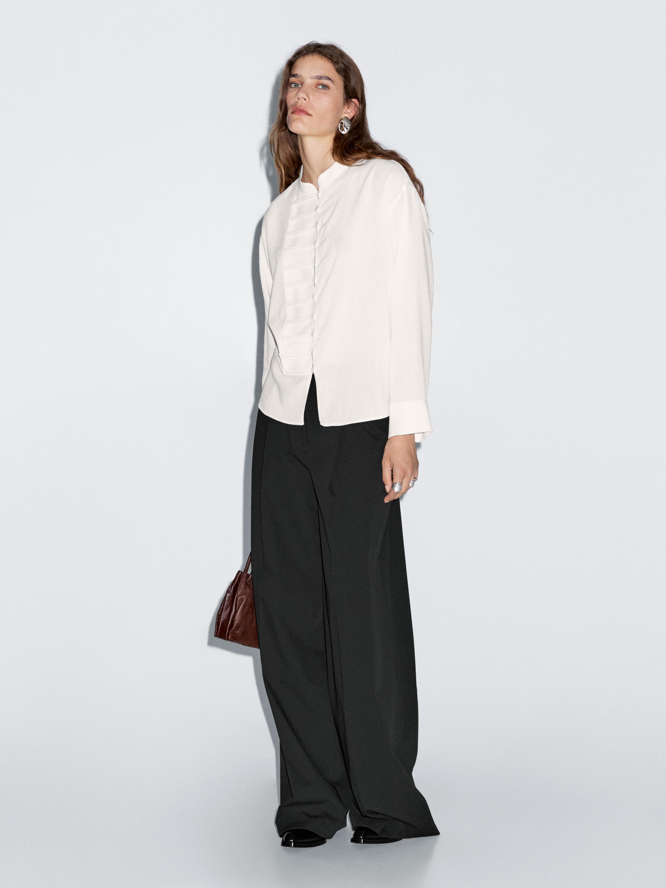 Top met ronde hals en naaddetails