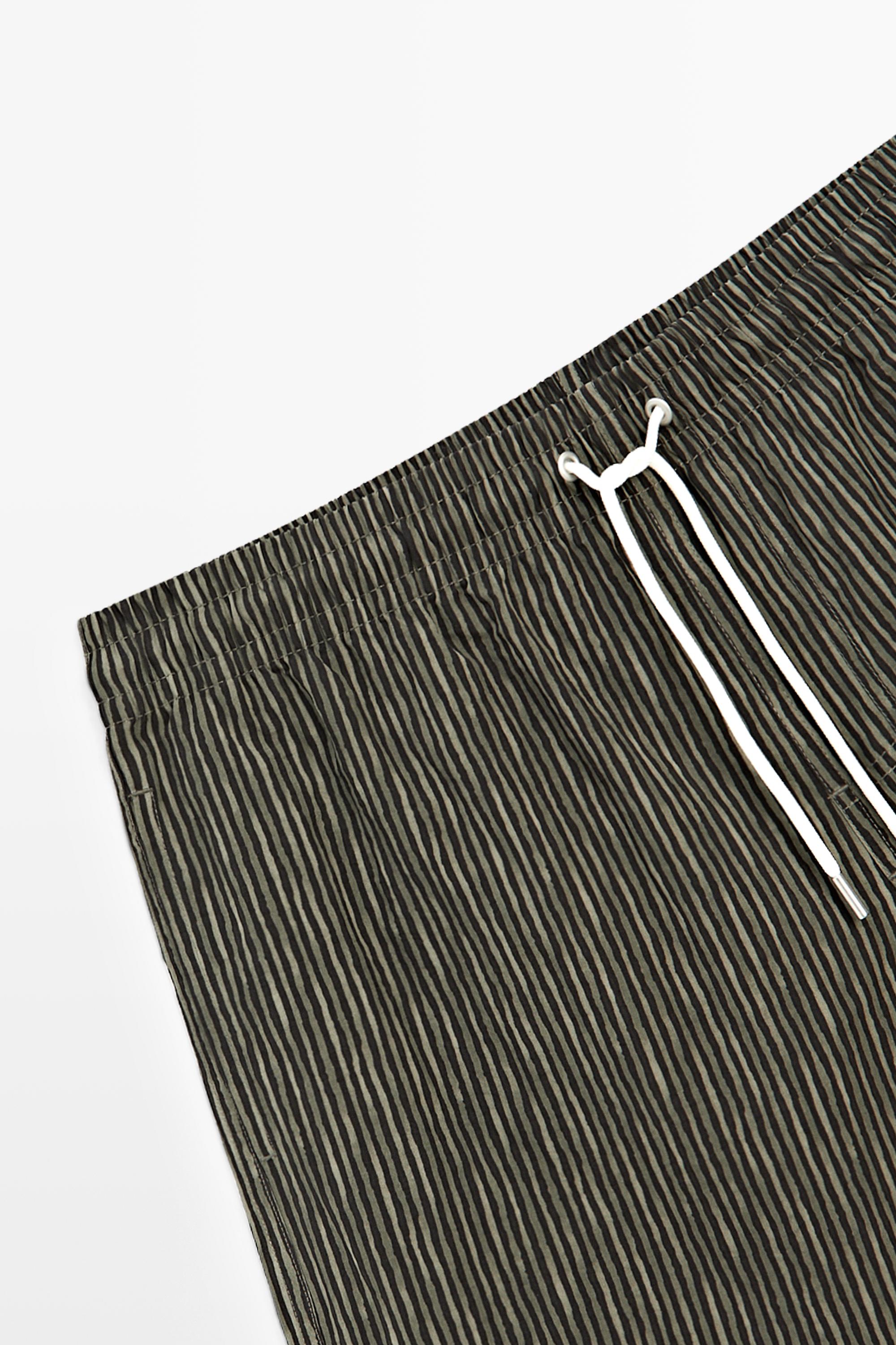 Striped print swimming trunks — KHAKI
