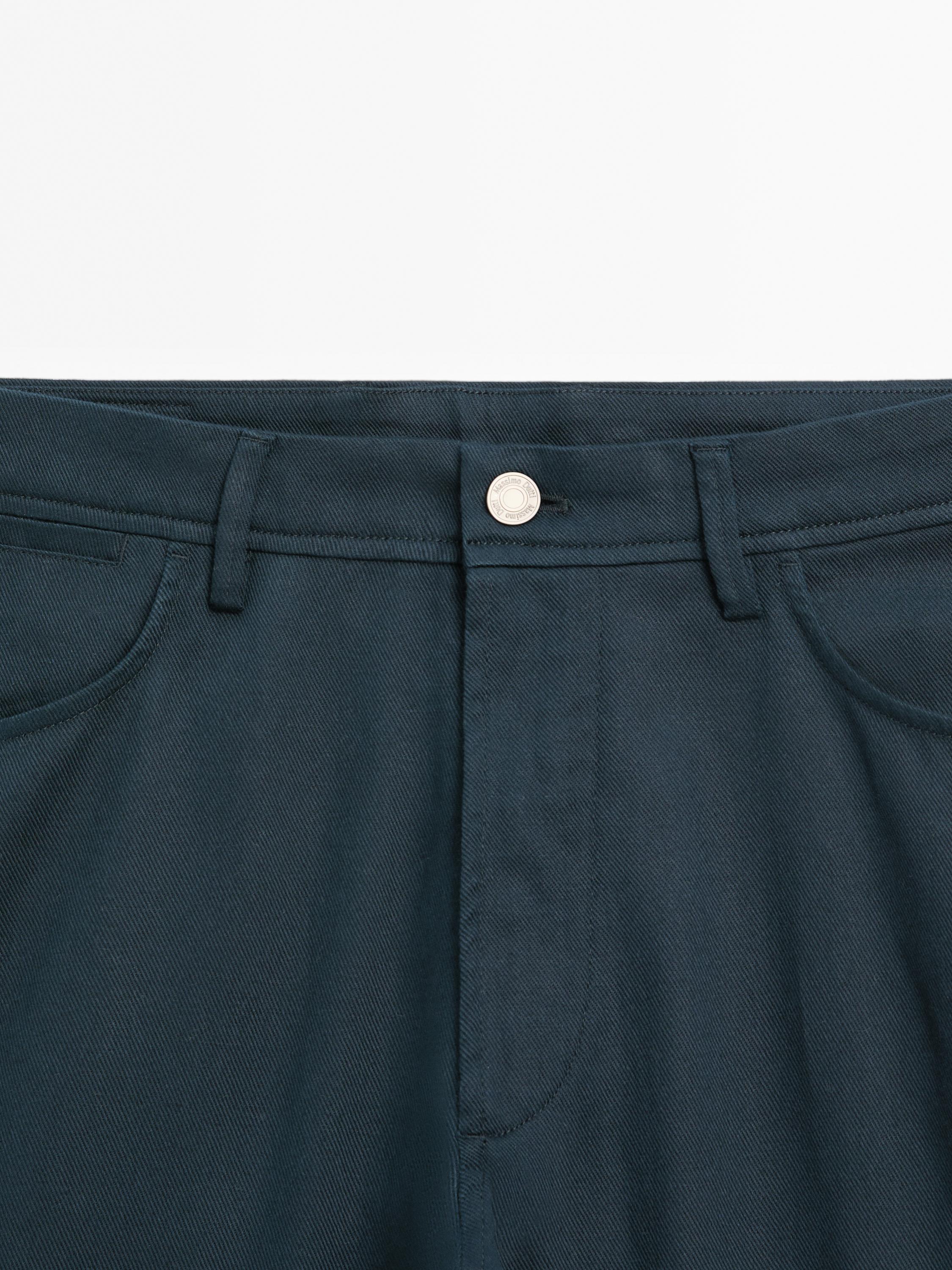 Cotton blend tapered fit denim trousers