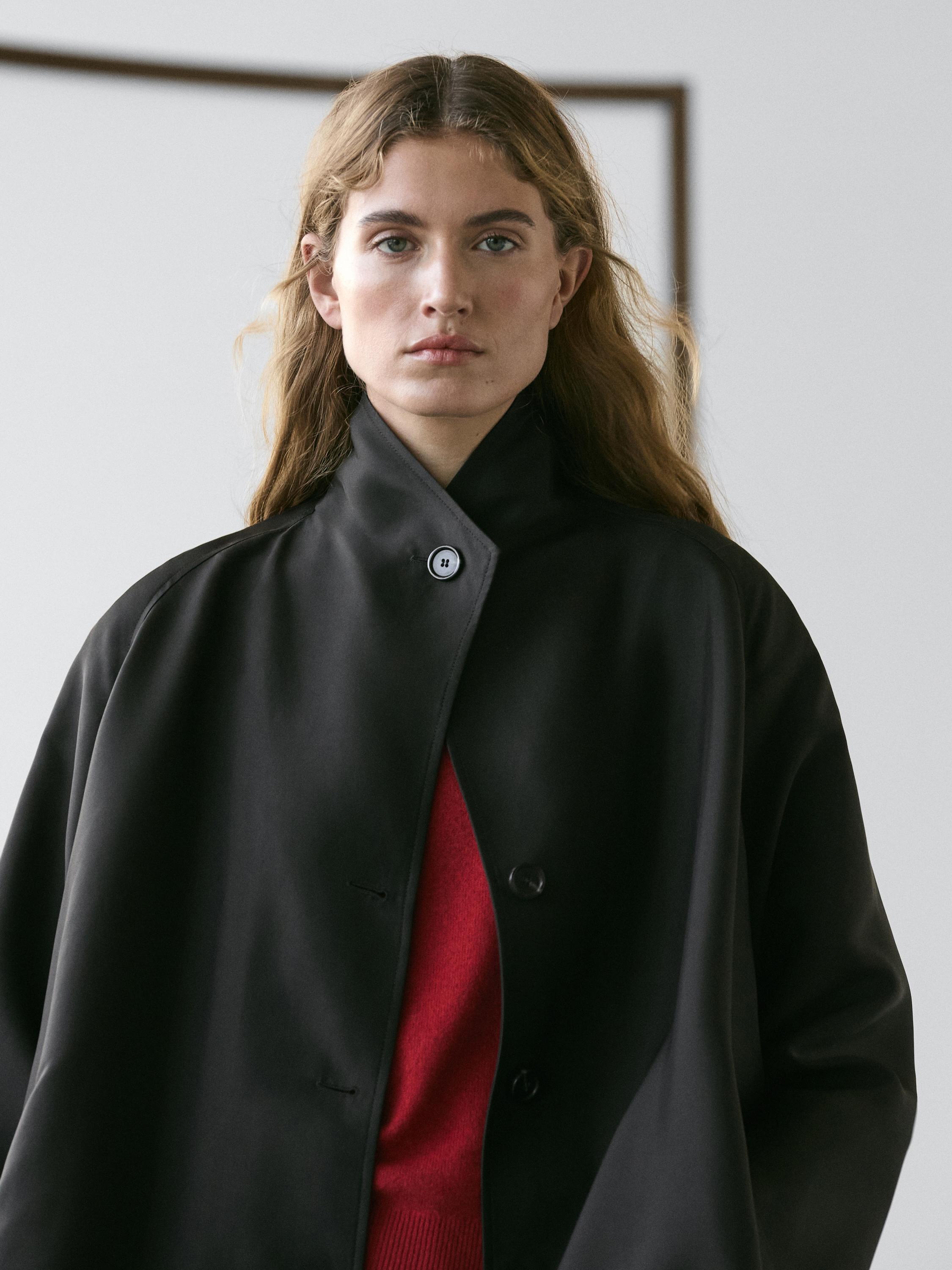 Flowing voluminous cape with button details — BLACK