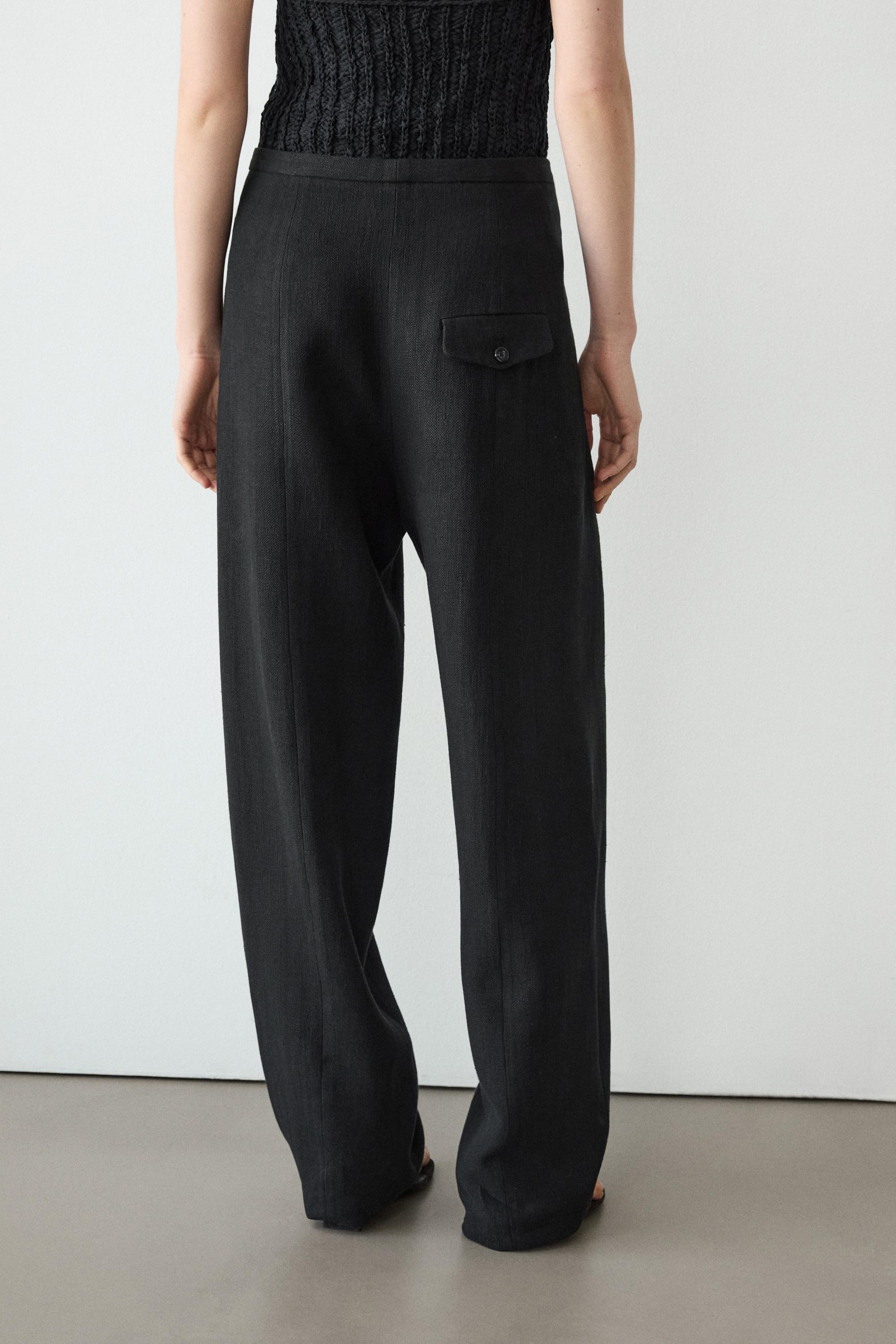 Flowing linen blend trousers with pocket details — BLACK