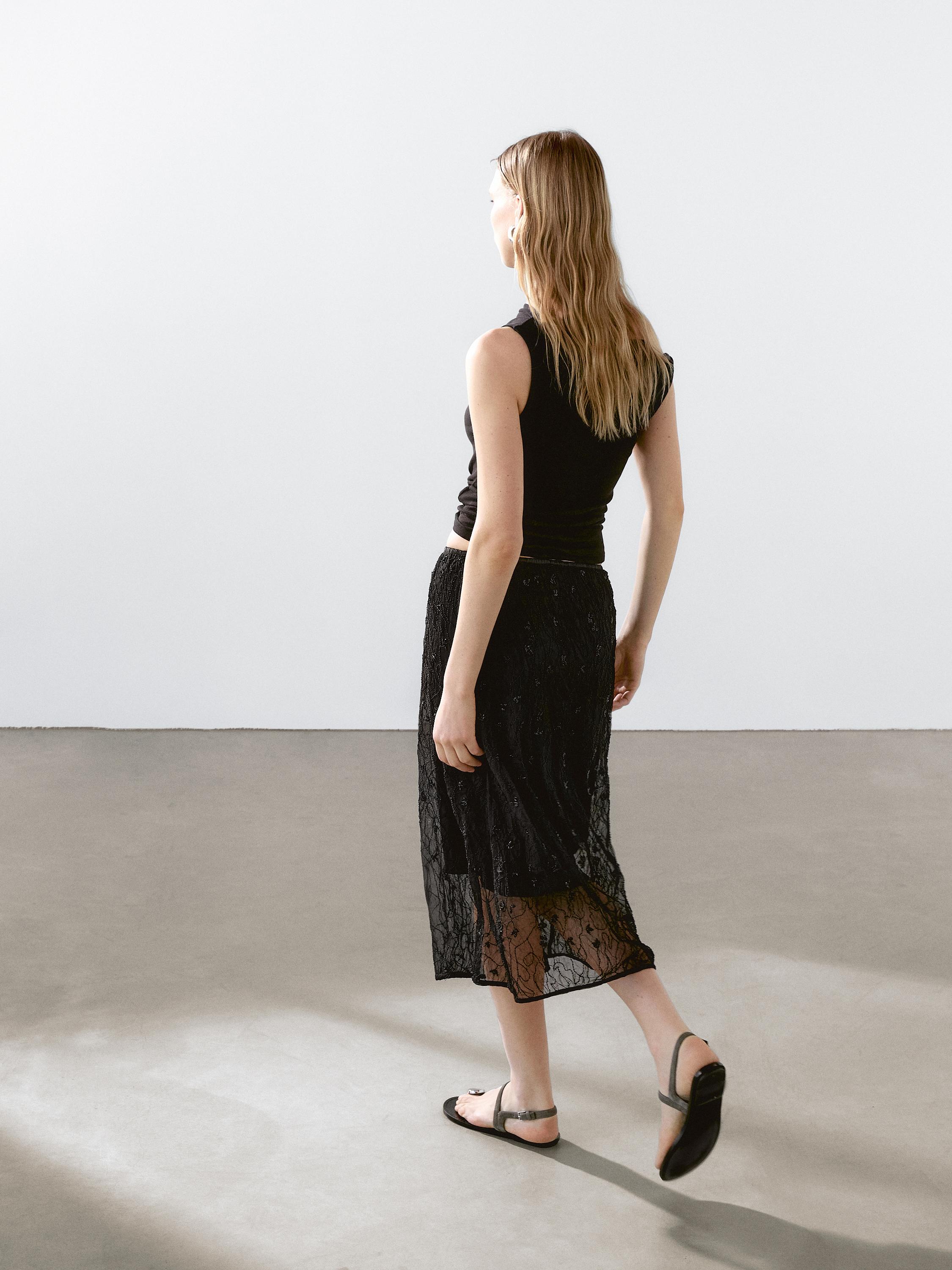 Halbtransparenter Midirock mit Strass