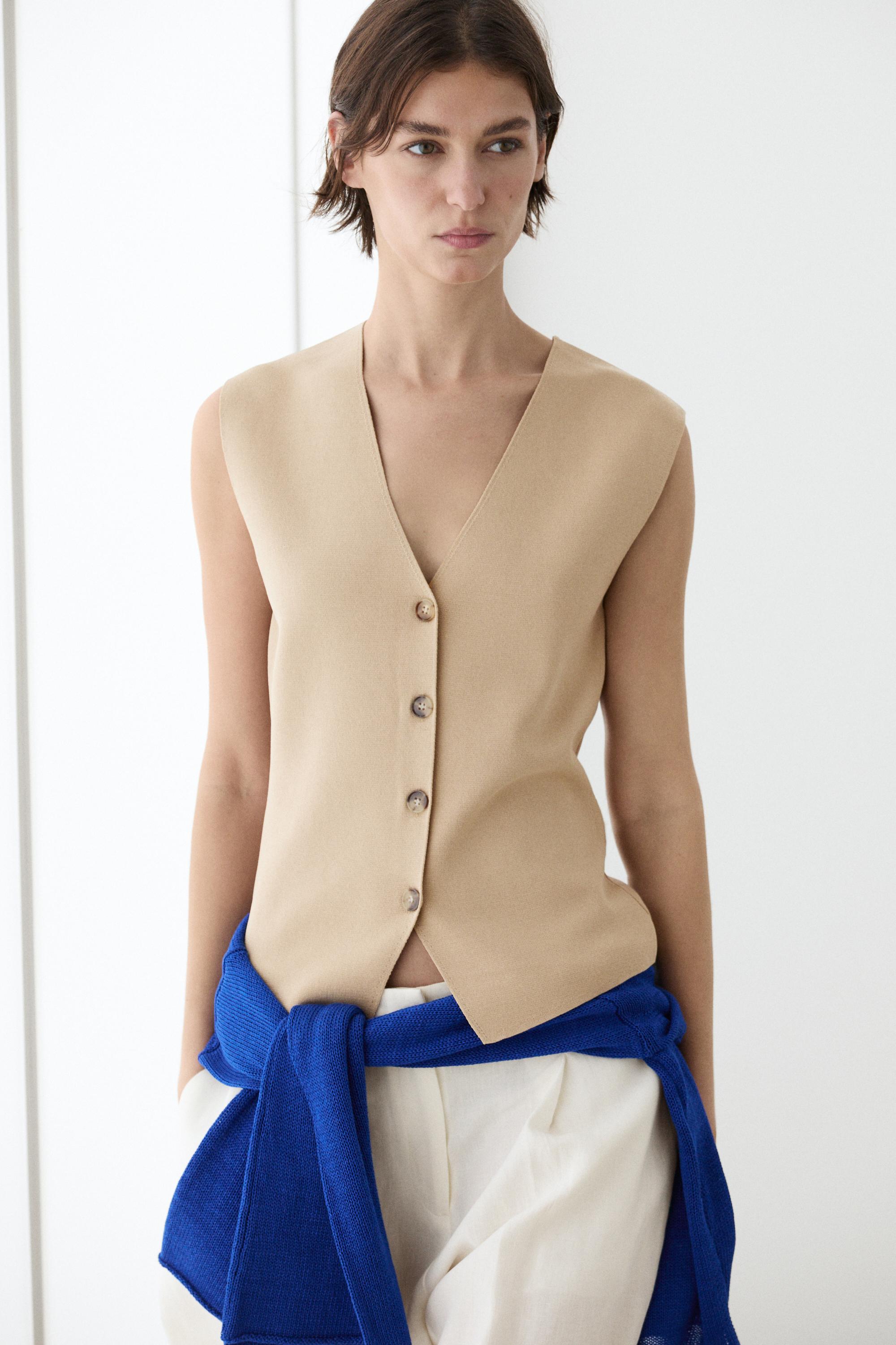 Knit waistcoat with button details — BEIGE
