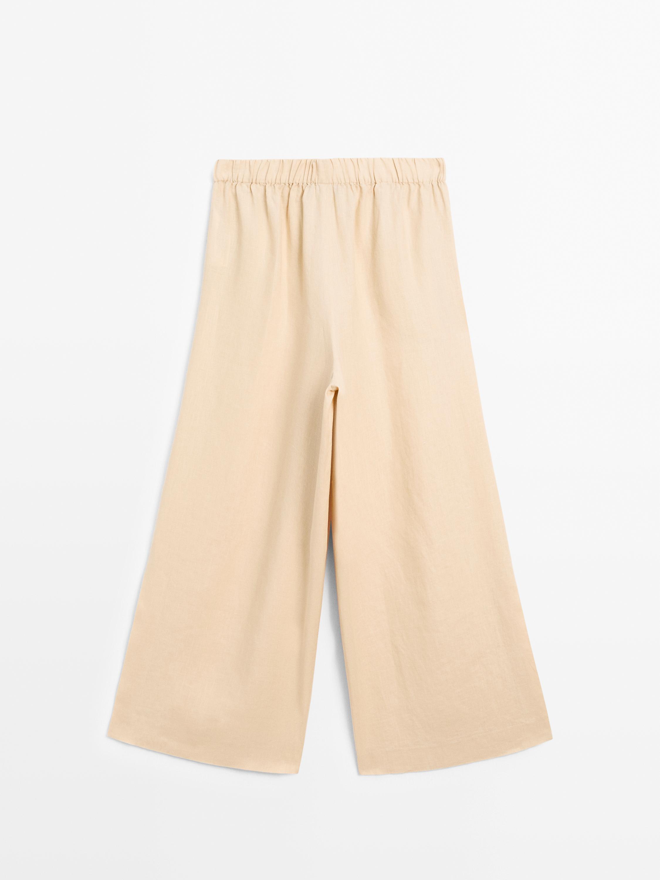 Flowing 100% linen trousers with elastic detail