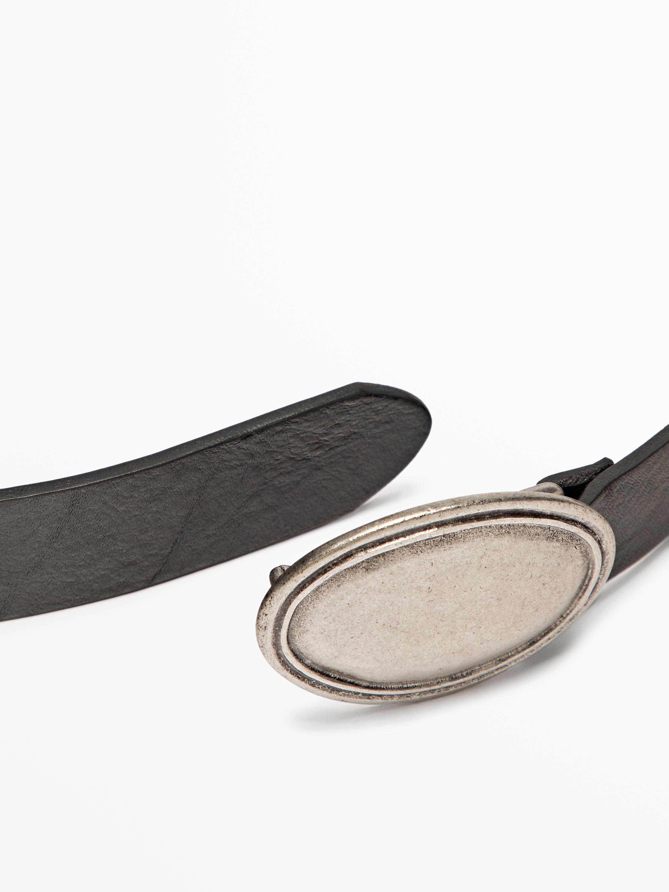 Leather belt with oval plate buckle
