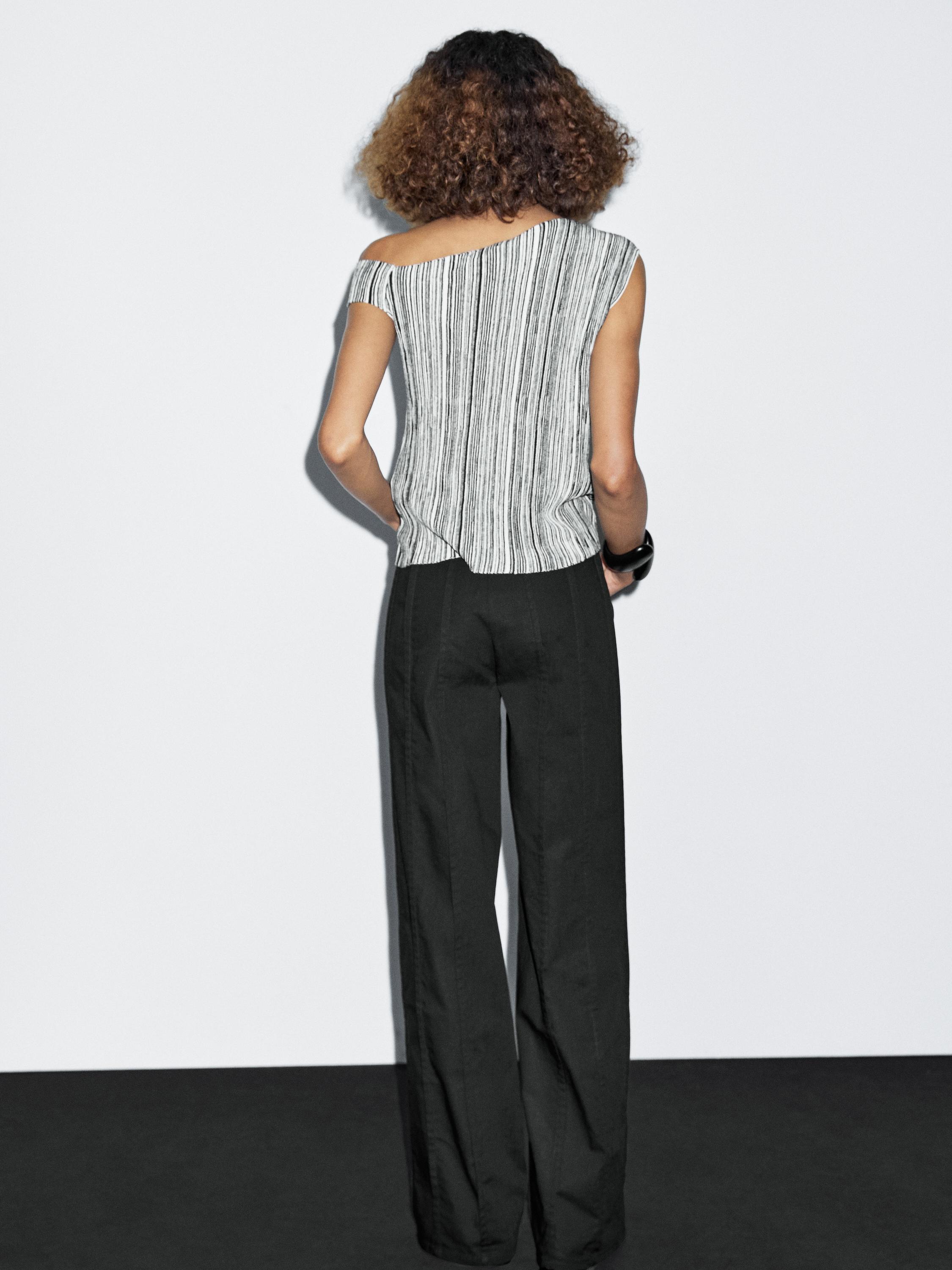 Wide-leg trousers with seam details