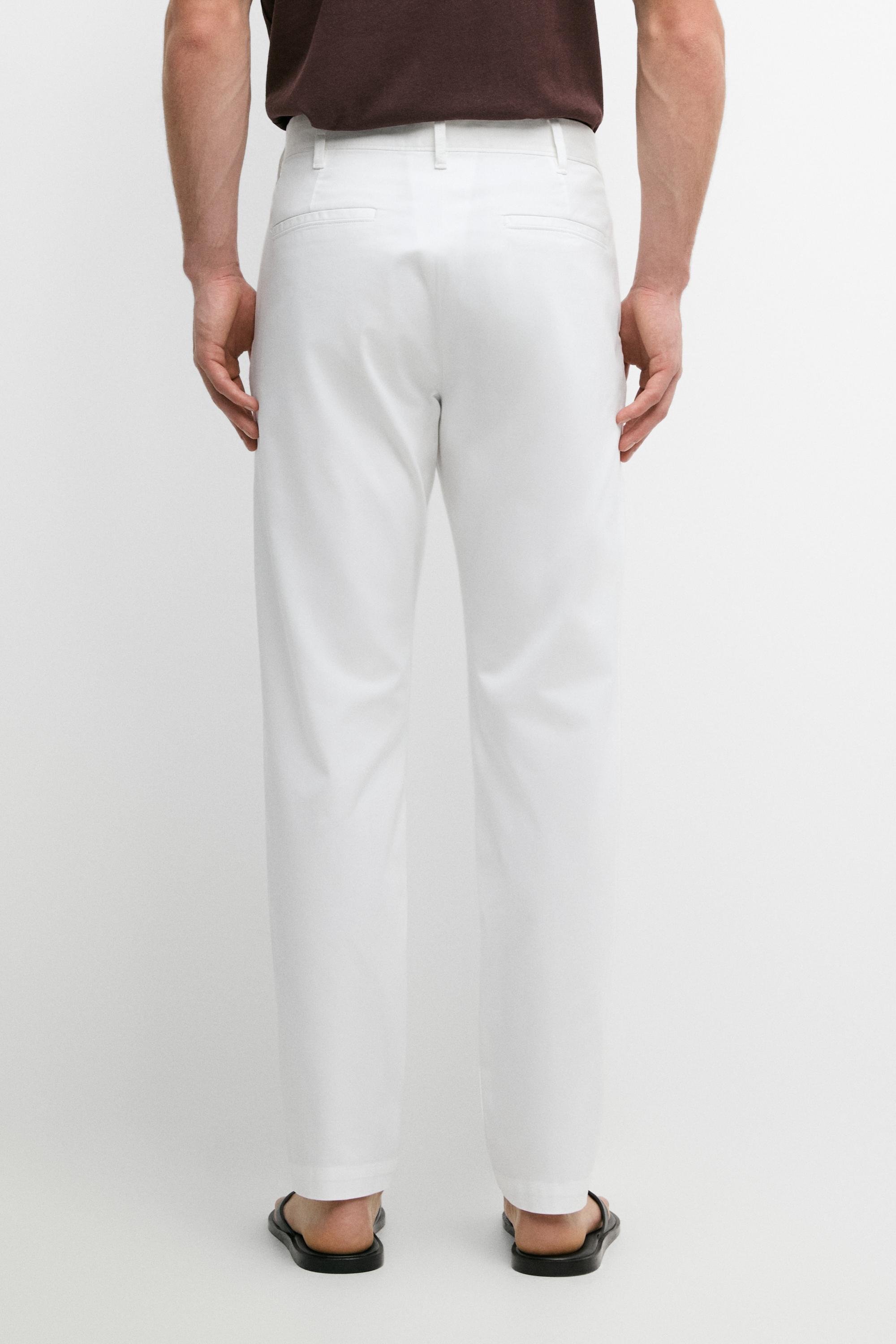 Cotton blend slim fit pants — Off white