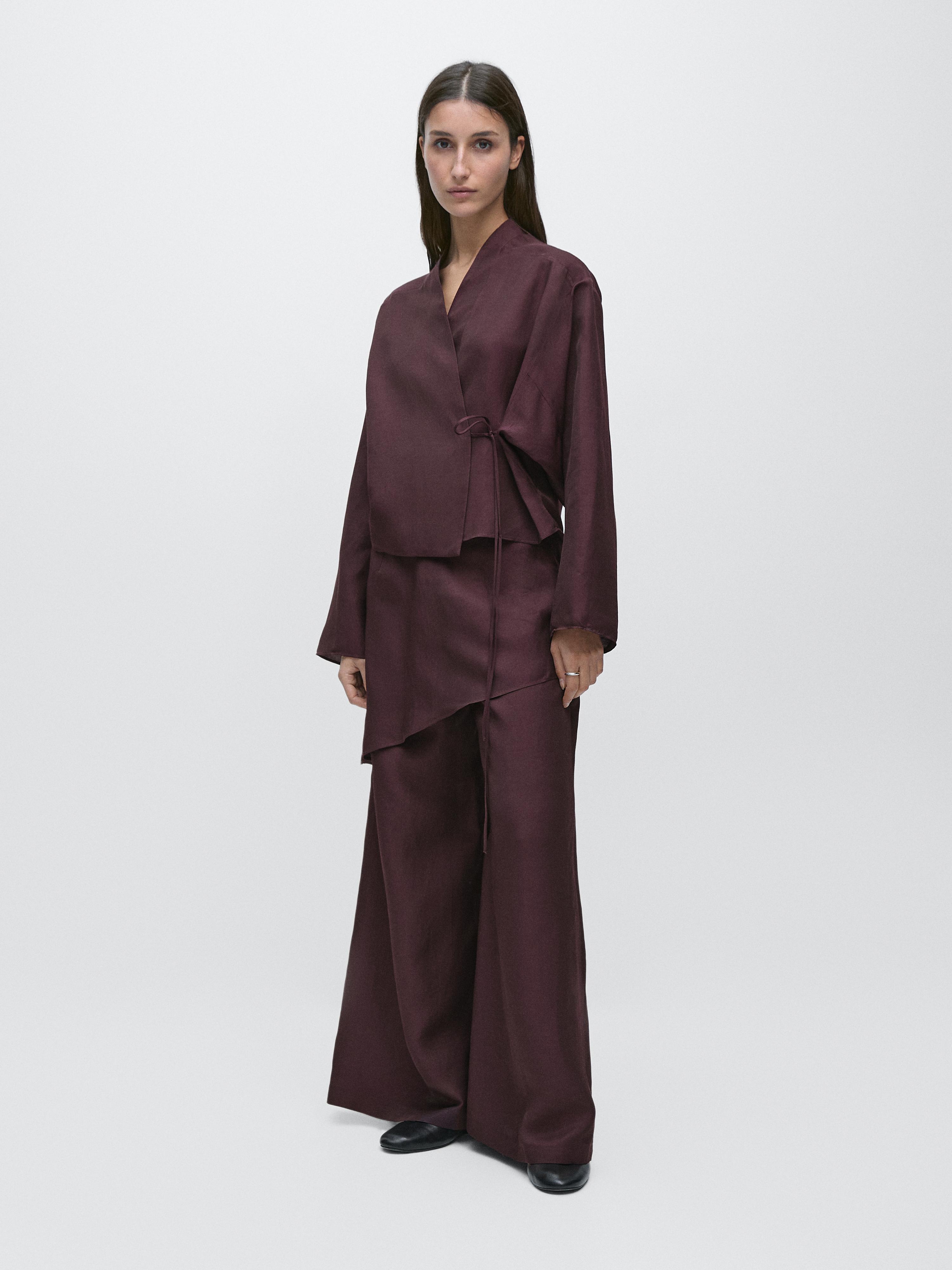 طقم قميص متقاطع وبنطلون واسع لون باذنجاني.