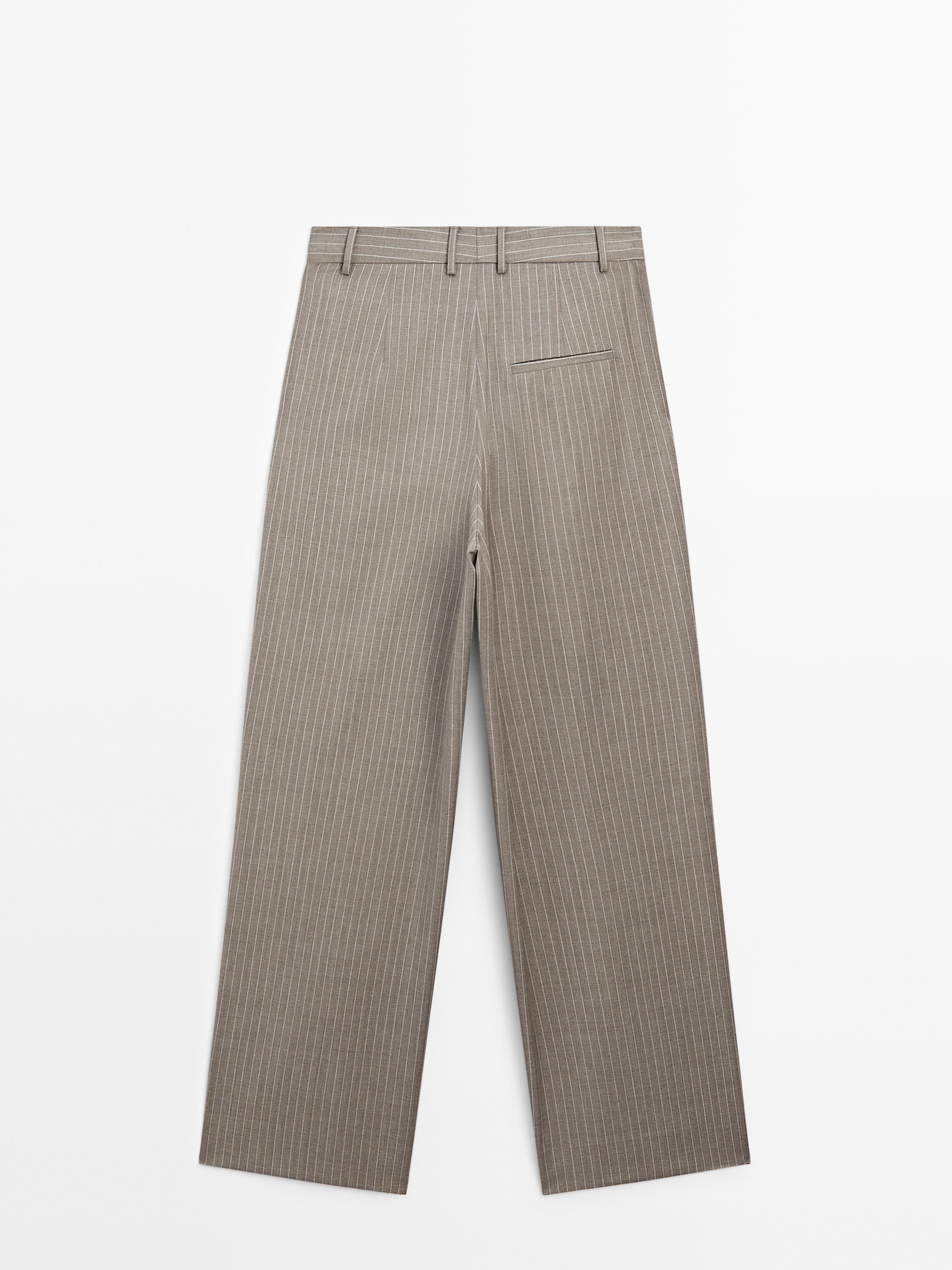 Pleated pinstripe trousers