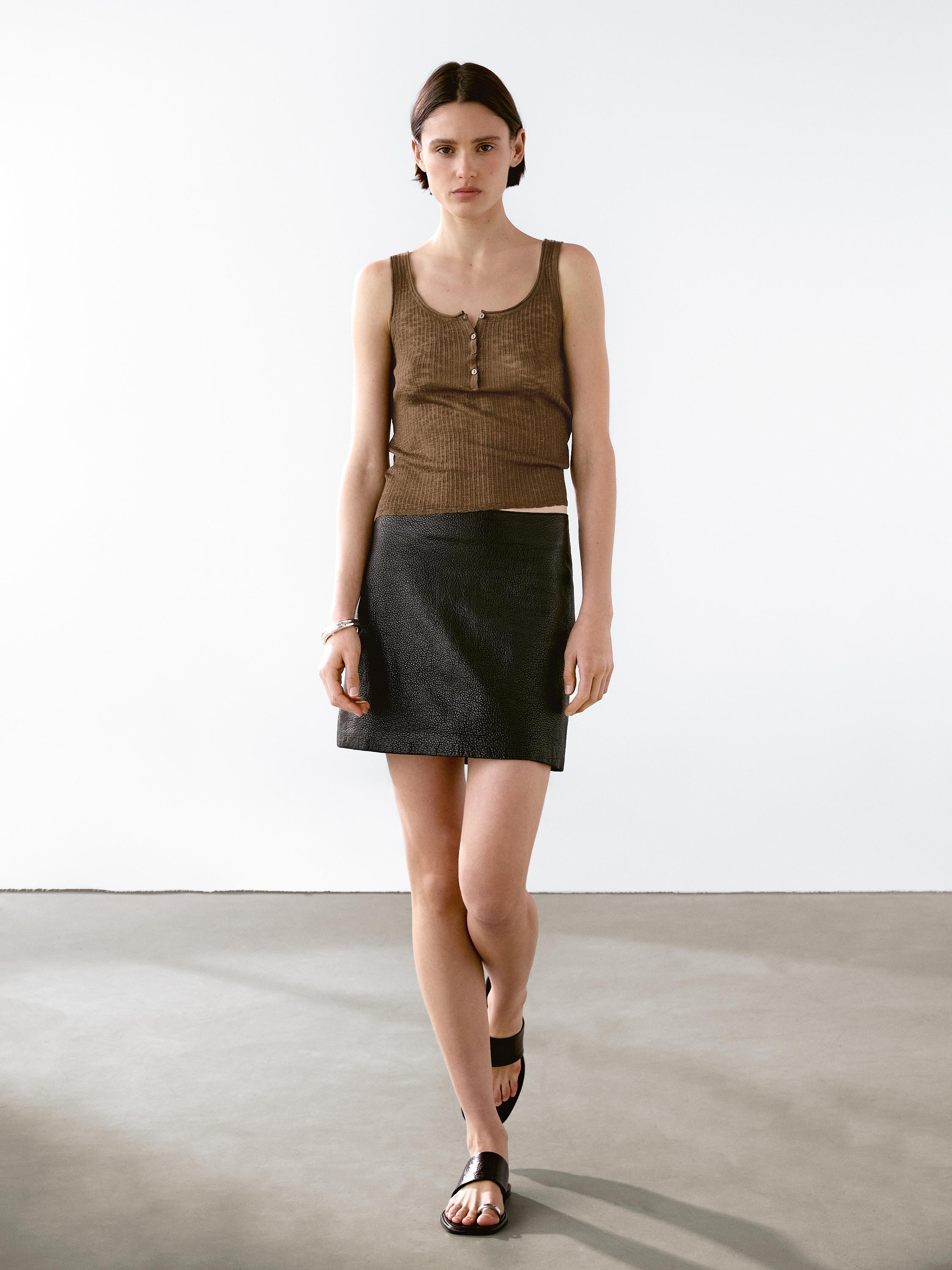 Textured nappa leather mini skirt