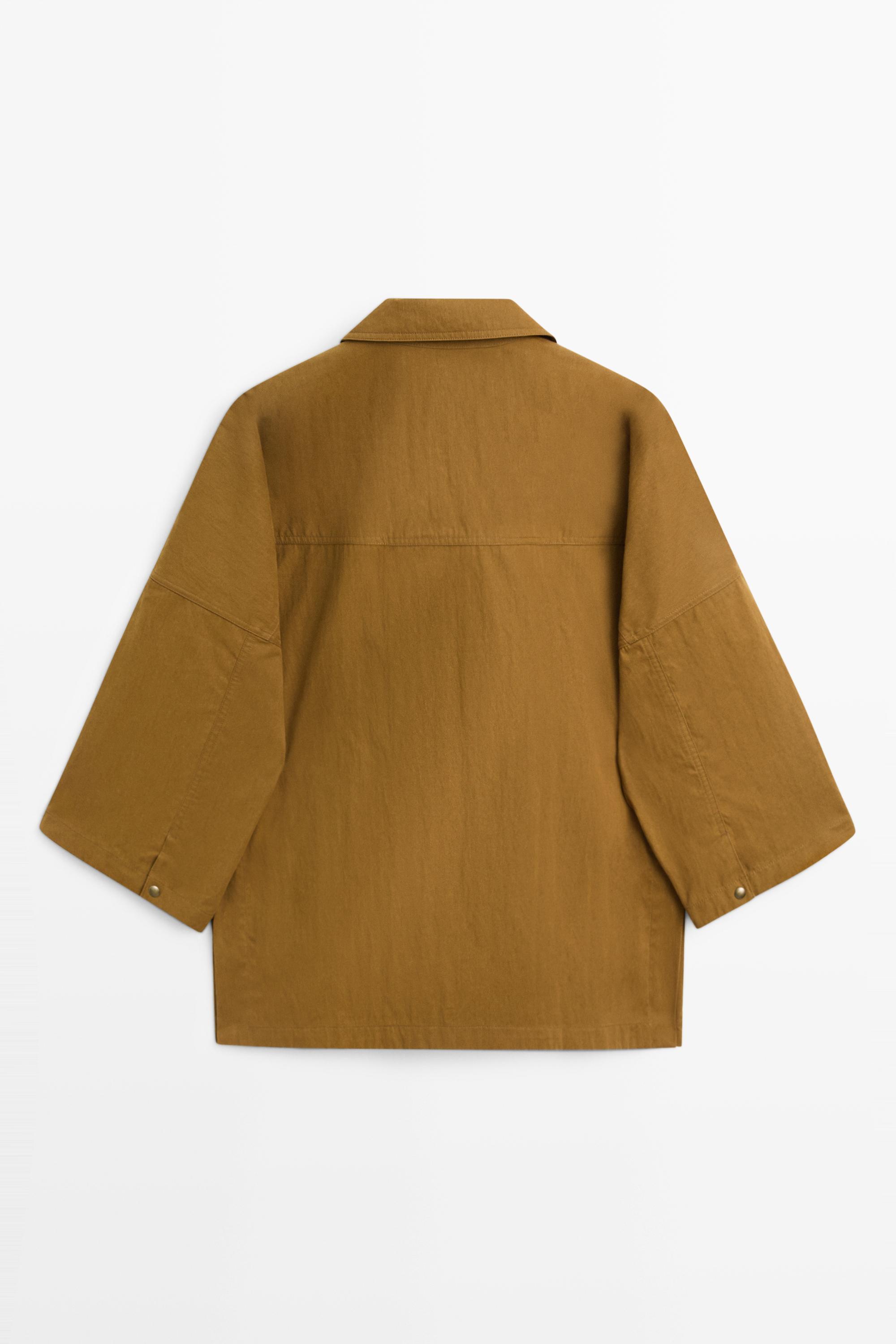Button-tab cape jacket — 0-013