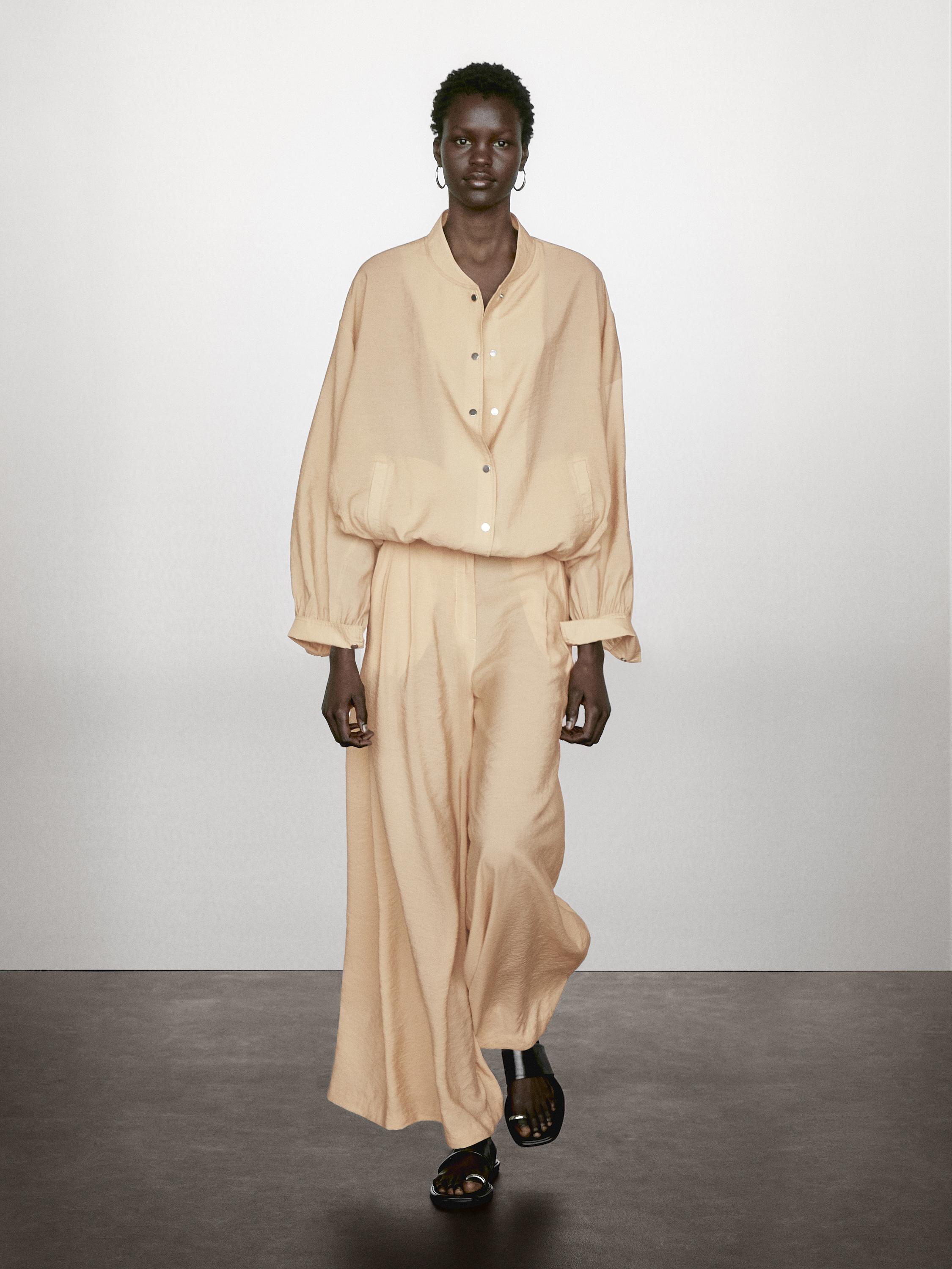 Pantaloni a palazzo con pince