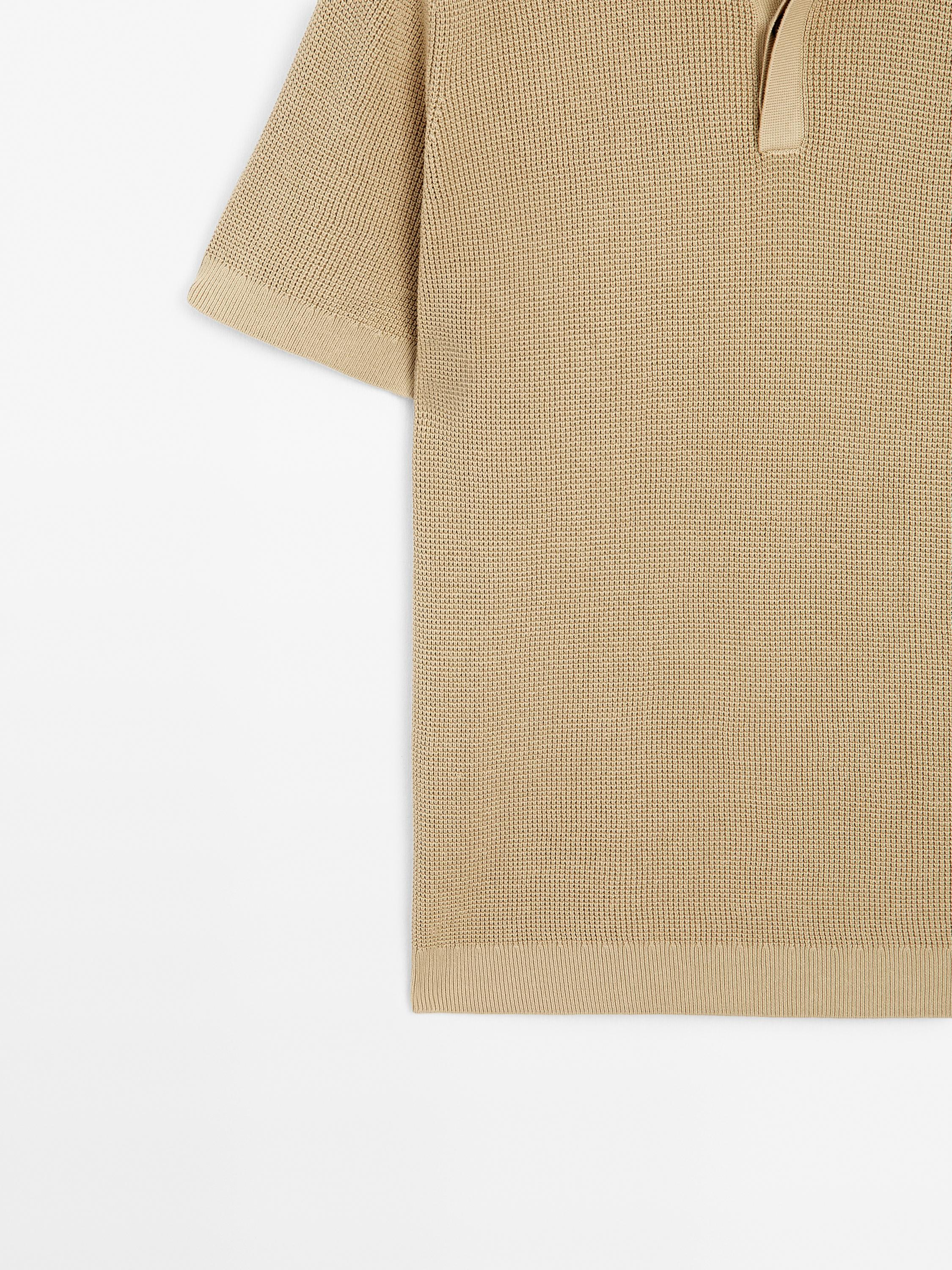 Polo en maille texturée de coton