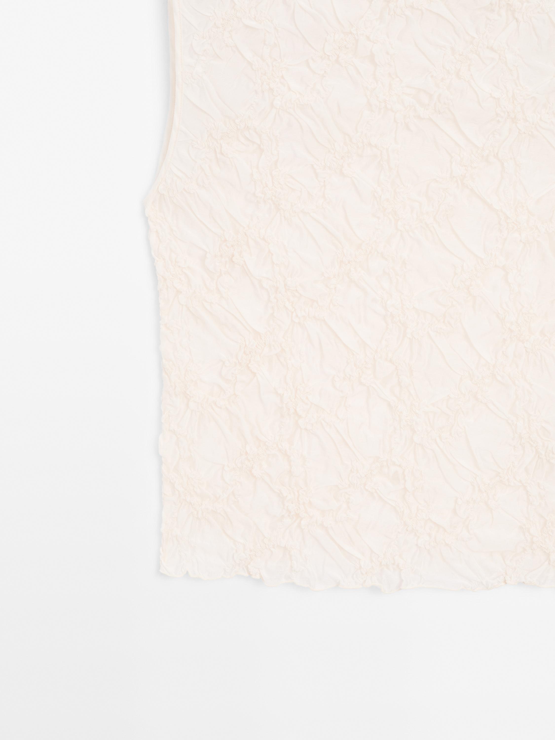 Creased-effect funnel neck top