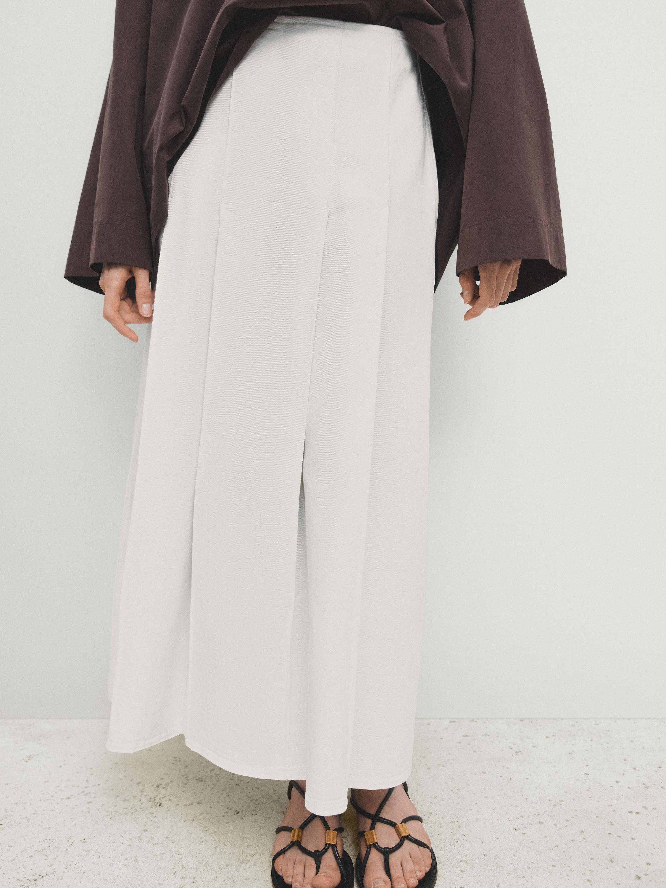 تنورة دنيم بليسيه