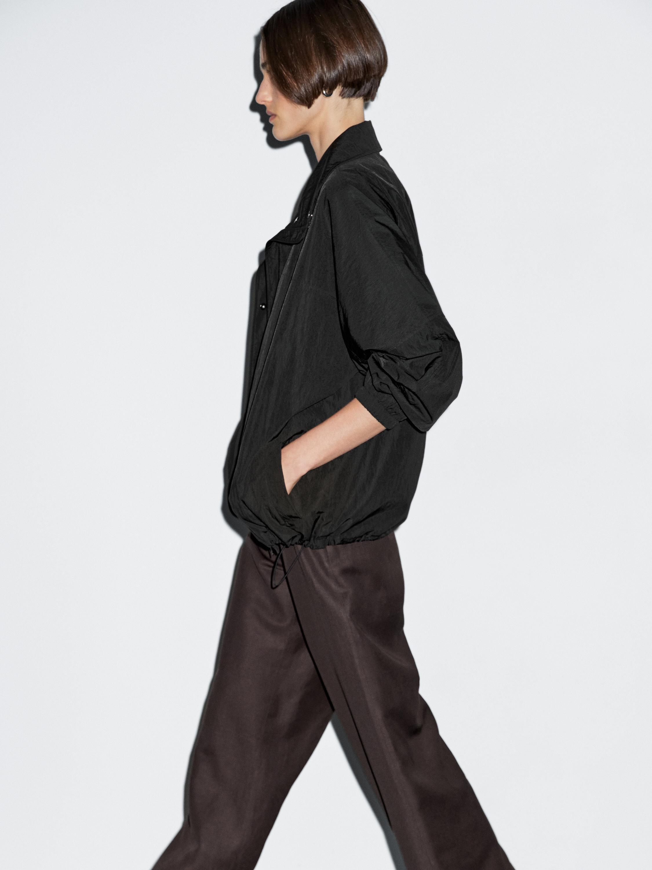 Veste technique bouffante à col montant