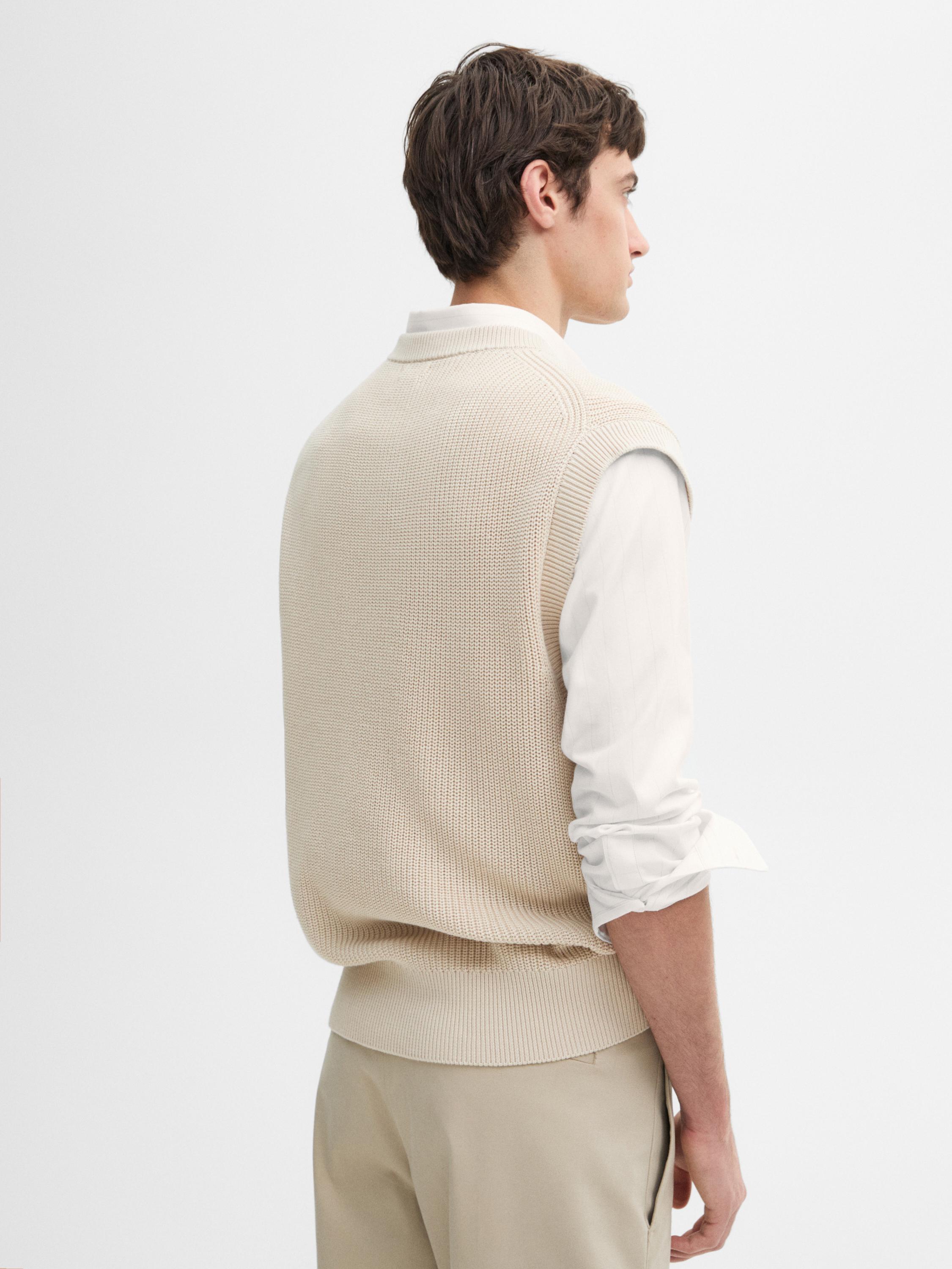 Veste sans manches en maille à col en V et bord-côte