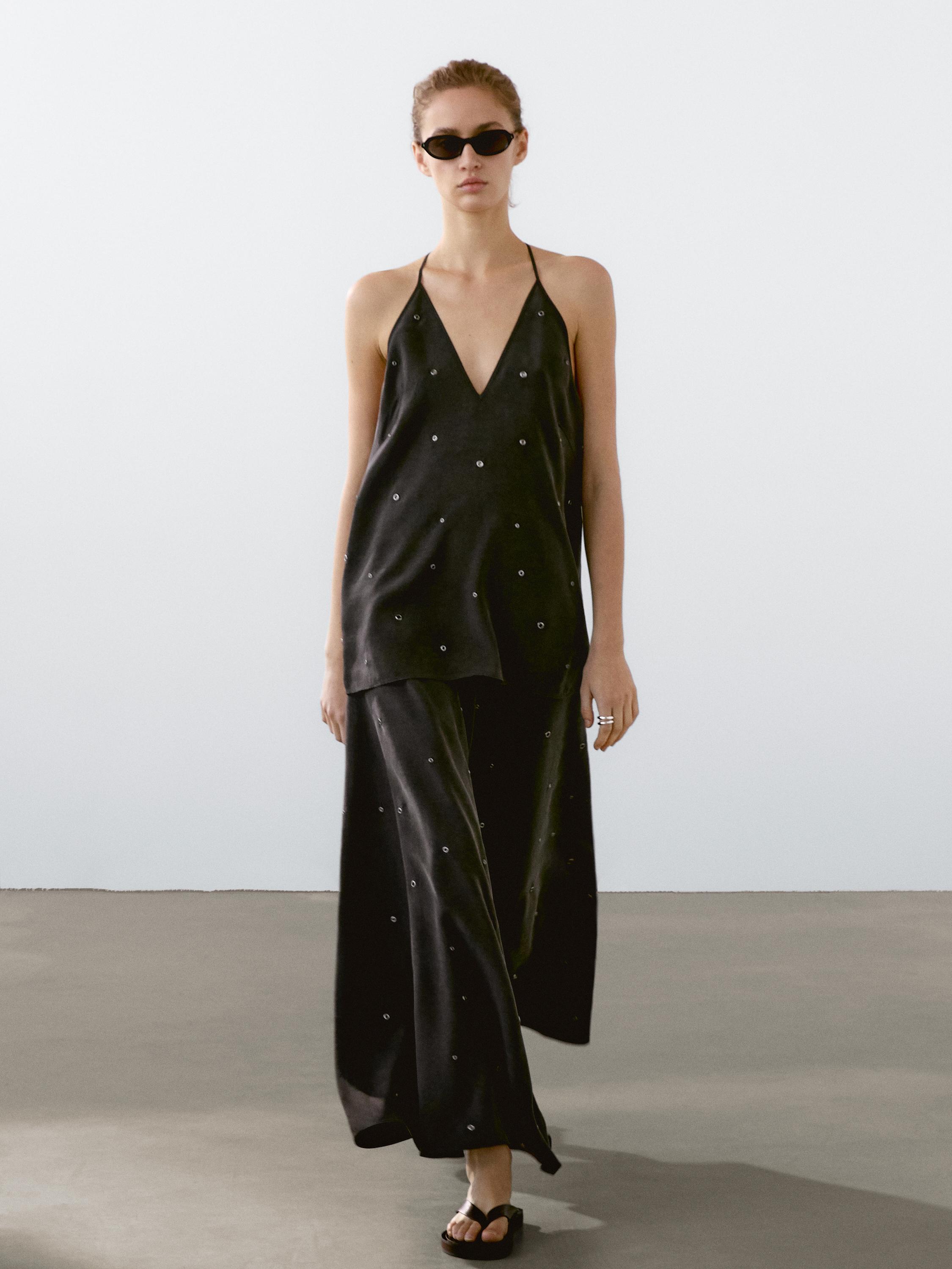 Long skirt with eyelets