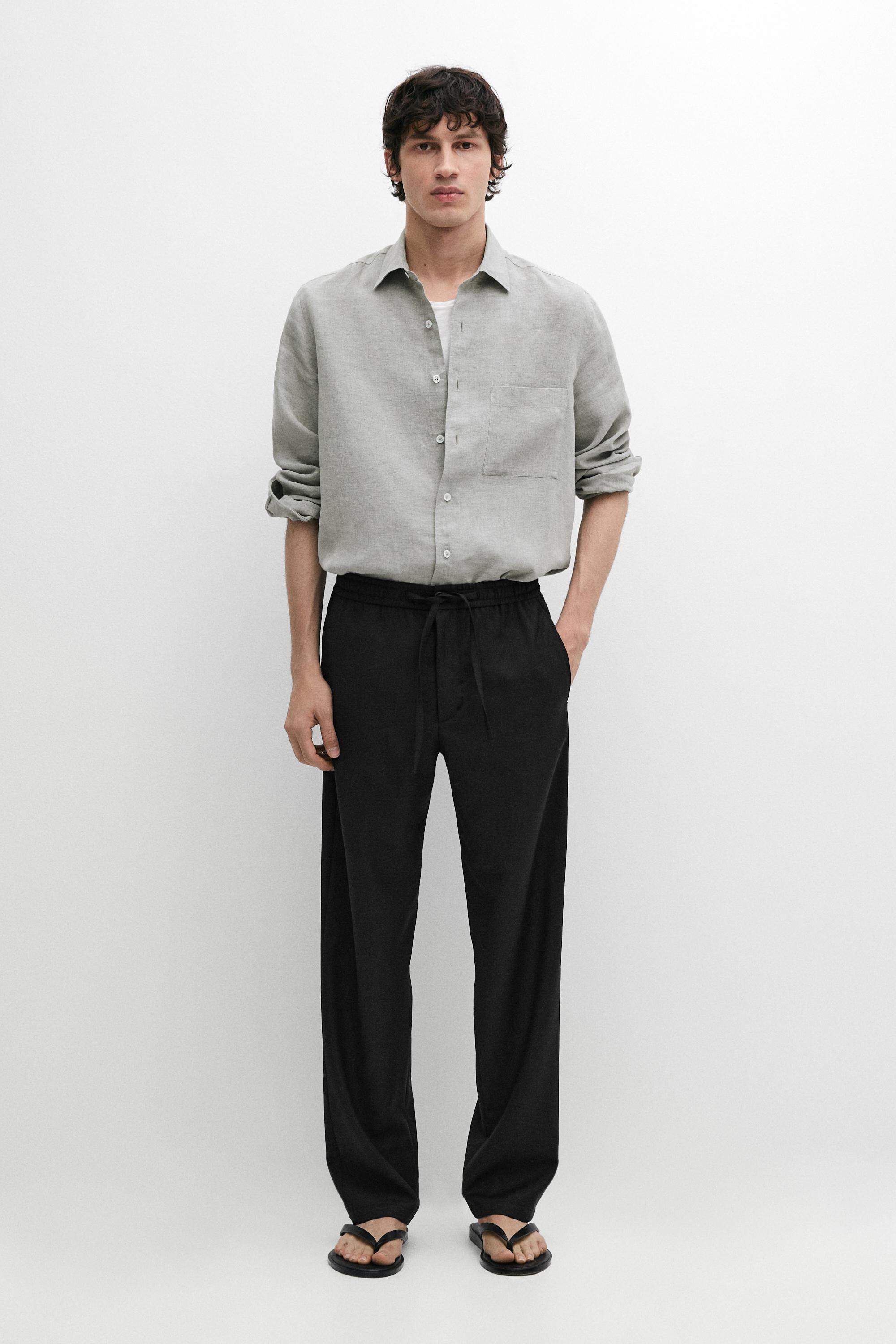Relaxed fit 100% wool trousers — BLACK