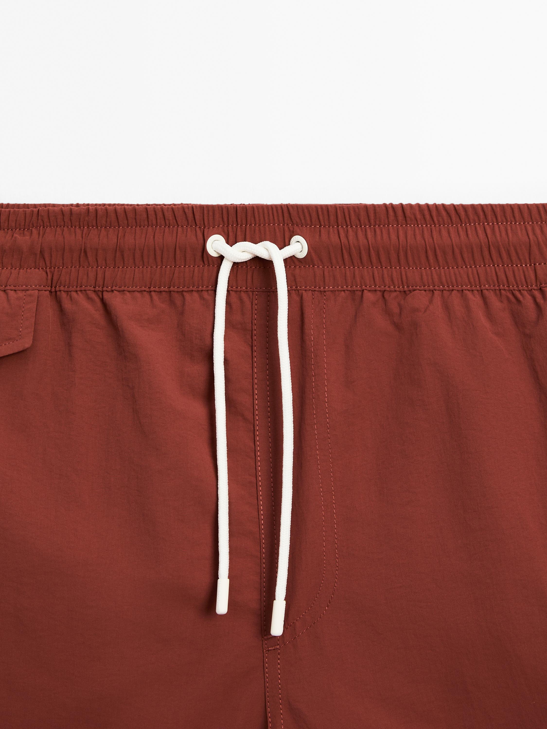 Plain regular fit swimming trunks