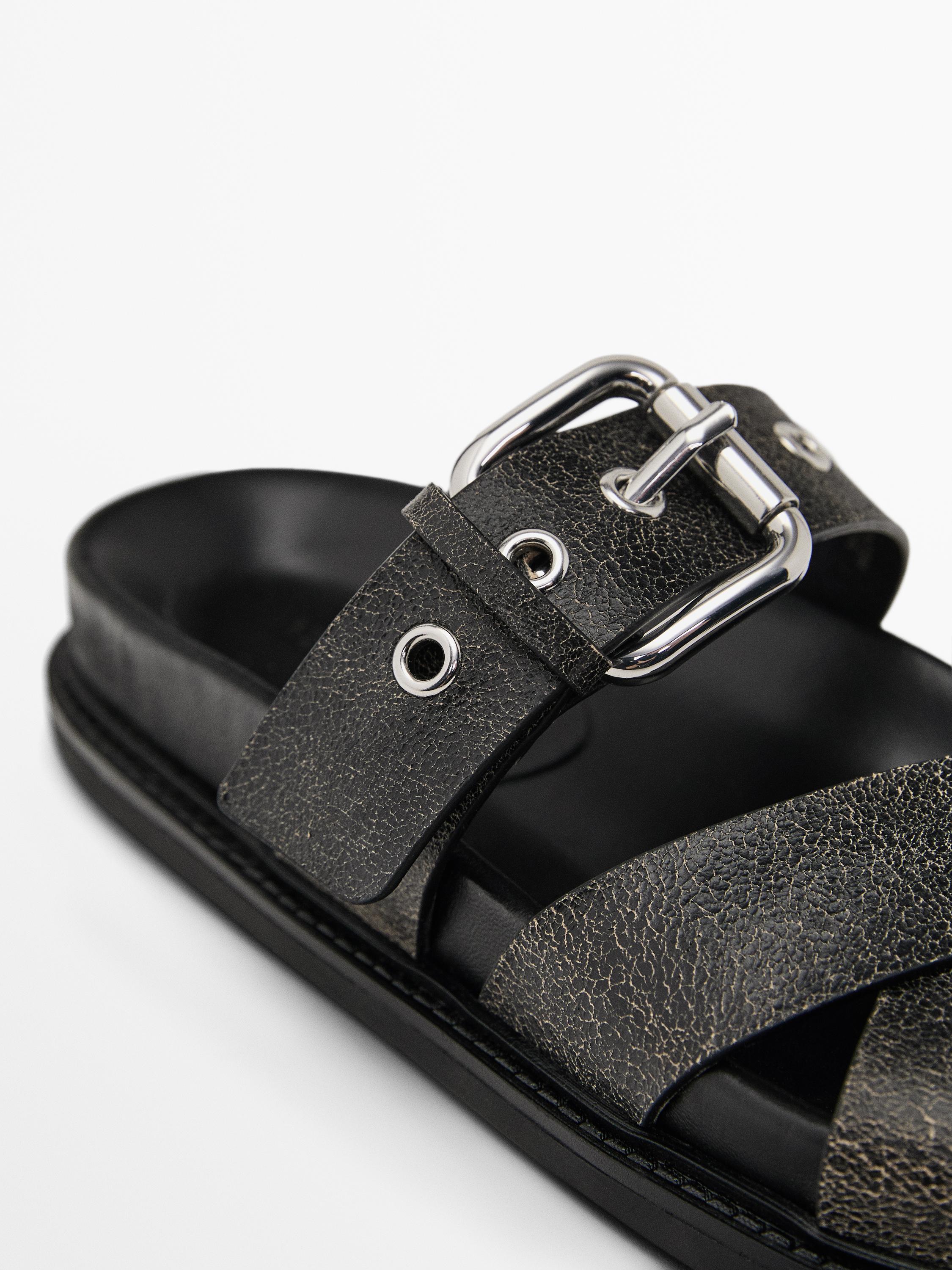 Crackled leather criss-cross sandals