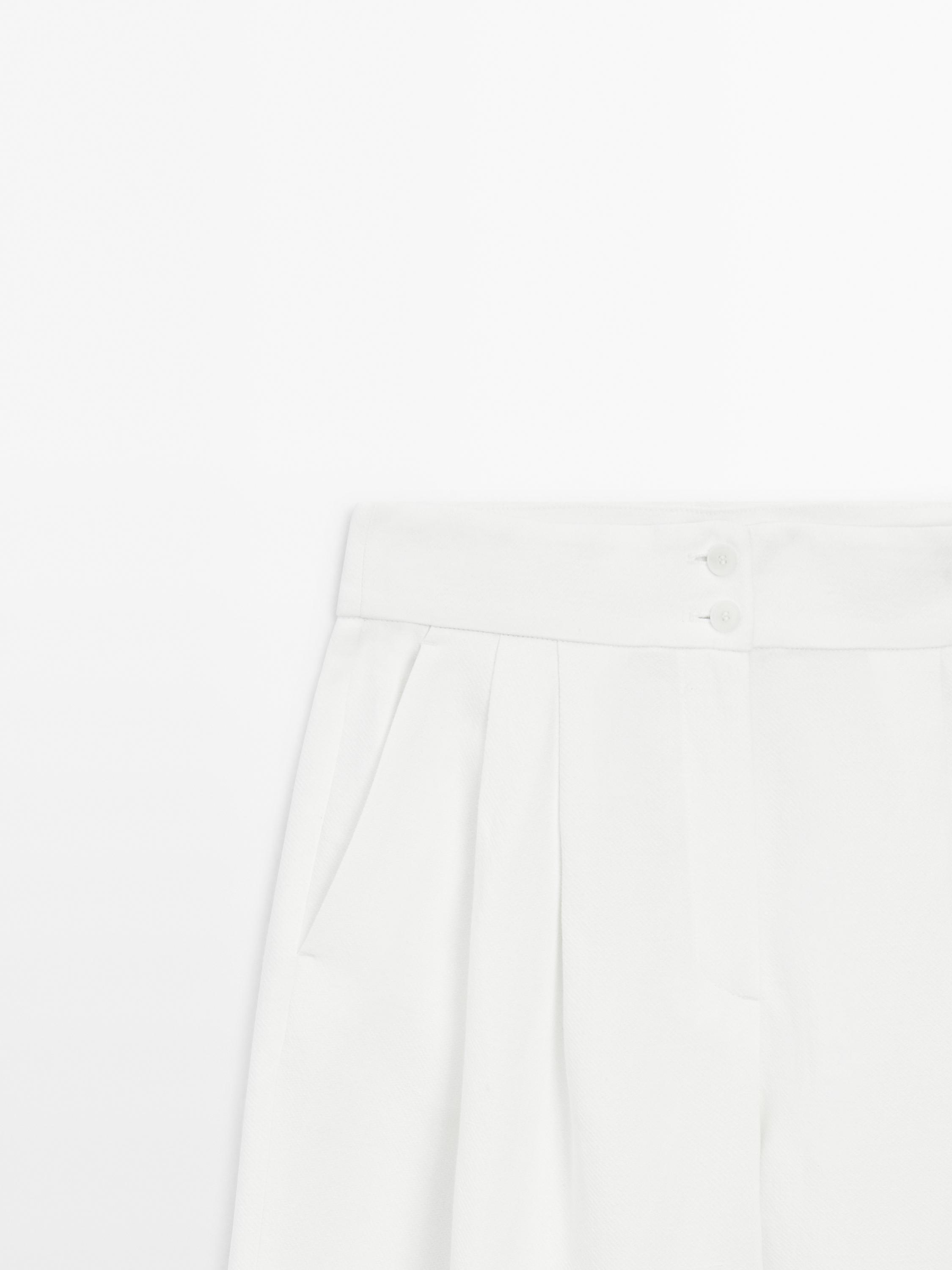 Flowing pleated palazzo trousers