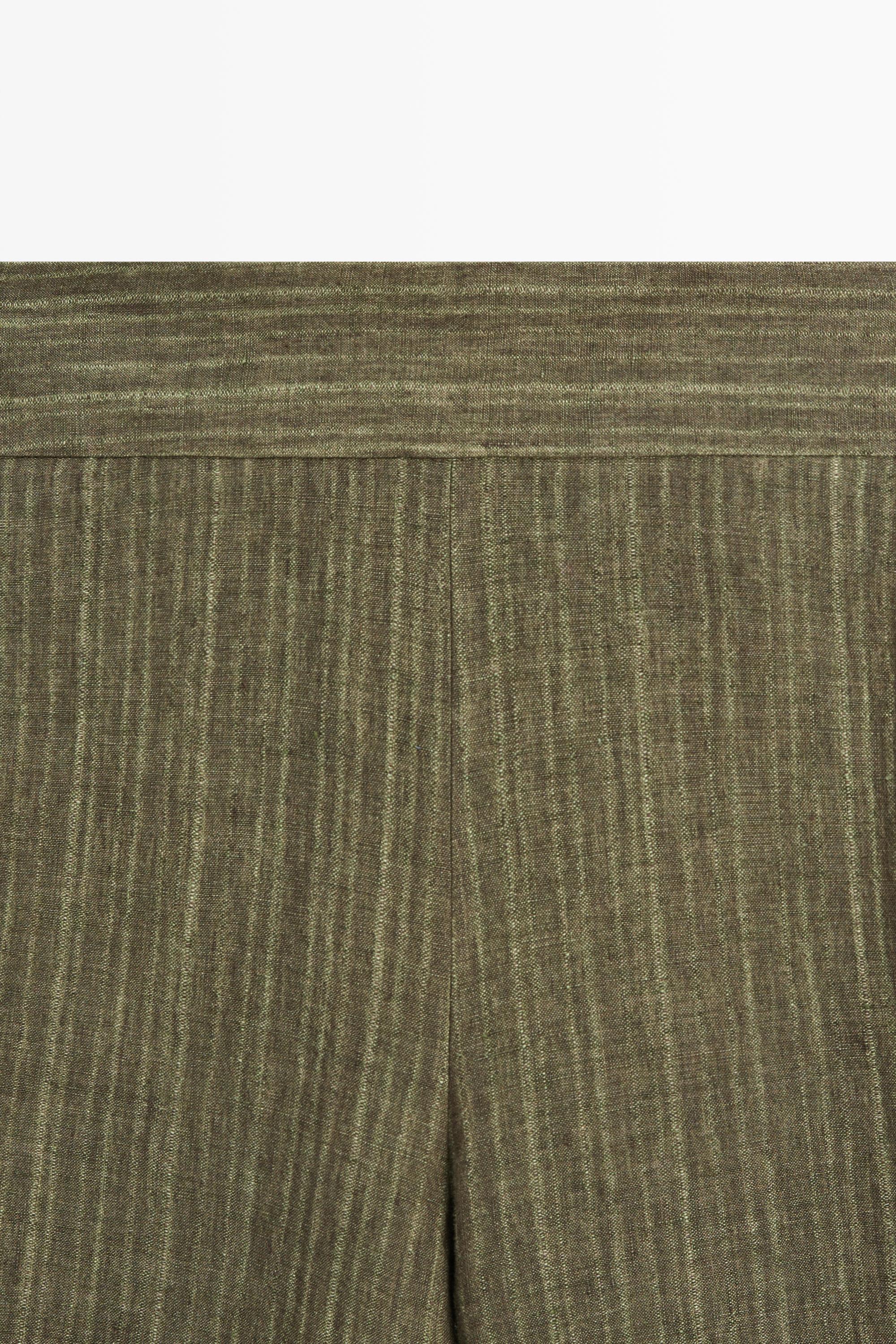 Total look linen trousers with corset belt detail — GREEN